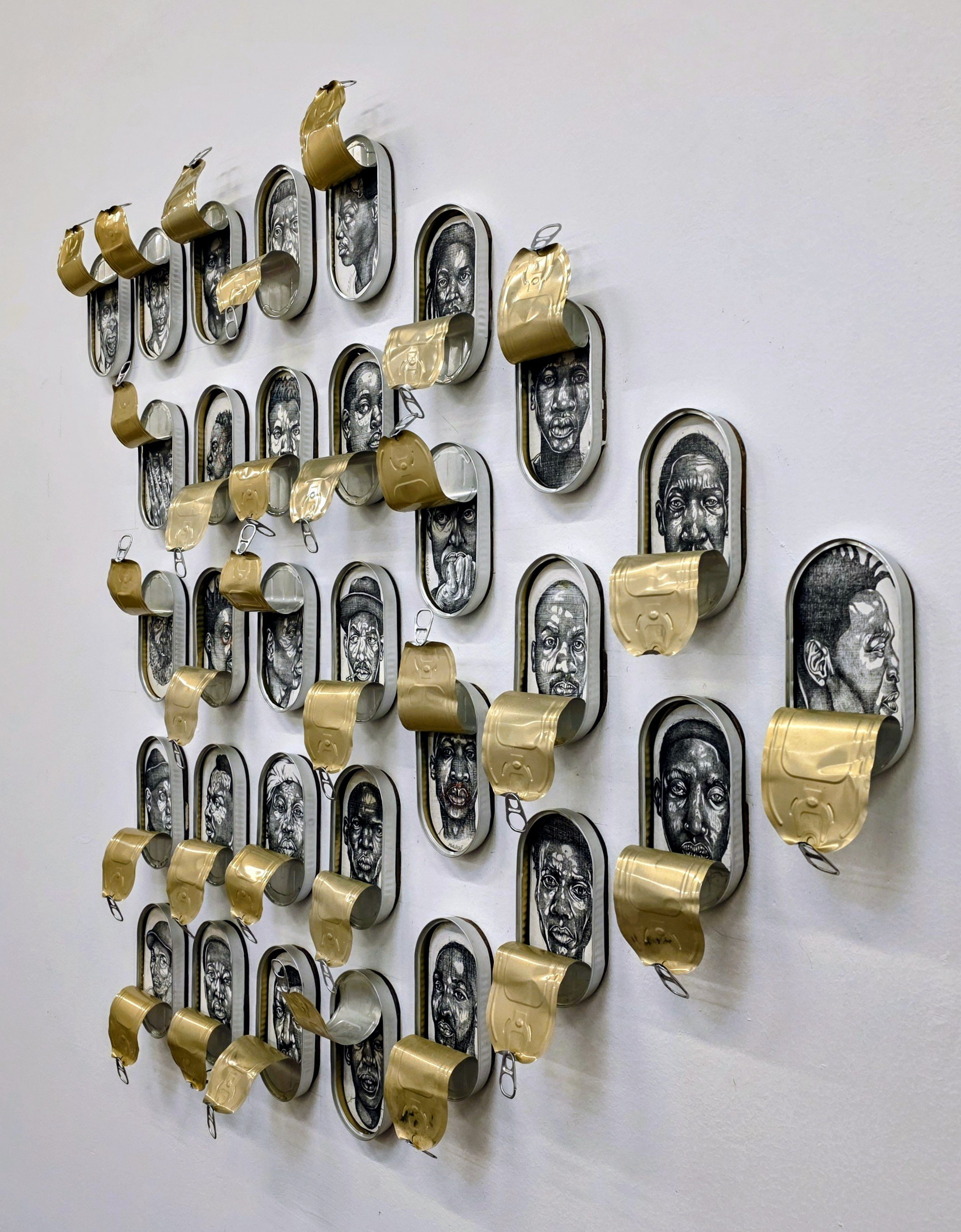 161 & 9 (excerpts 25 of 170), 2025.
Graphite on wood panel and sardine cans)