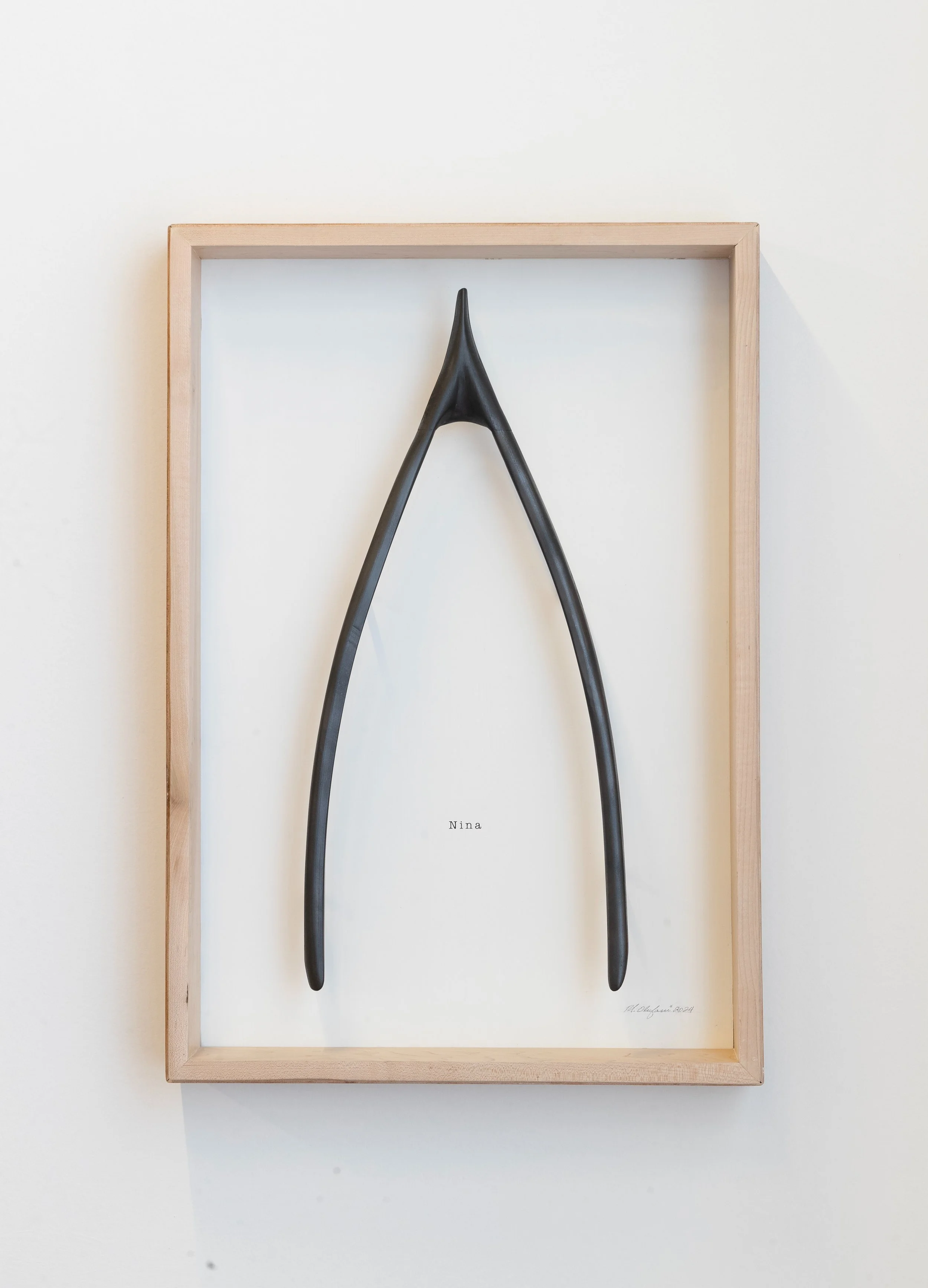 A Wishbone for Nina Simone
2024.
38” x 26” x 5”
carved wood, powdered charcoal and serigraph on wood panel.
***photograph by Benita Nnachortam***