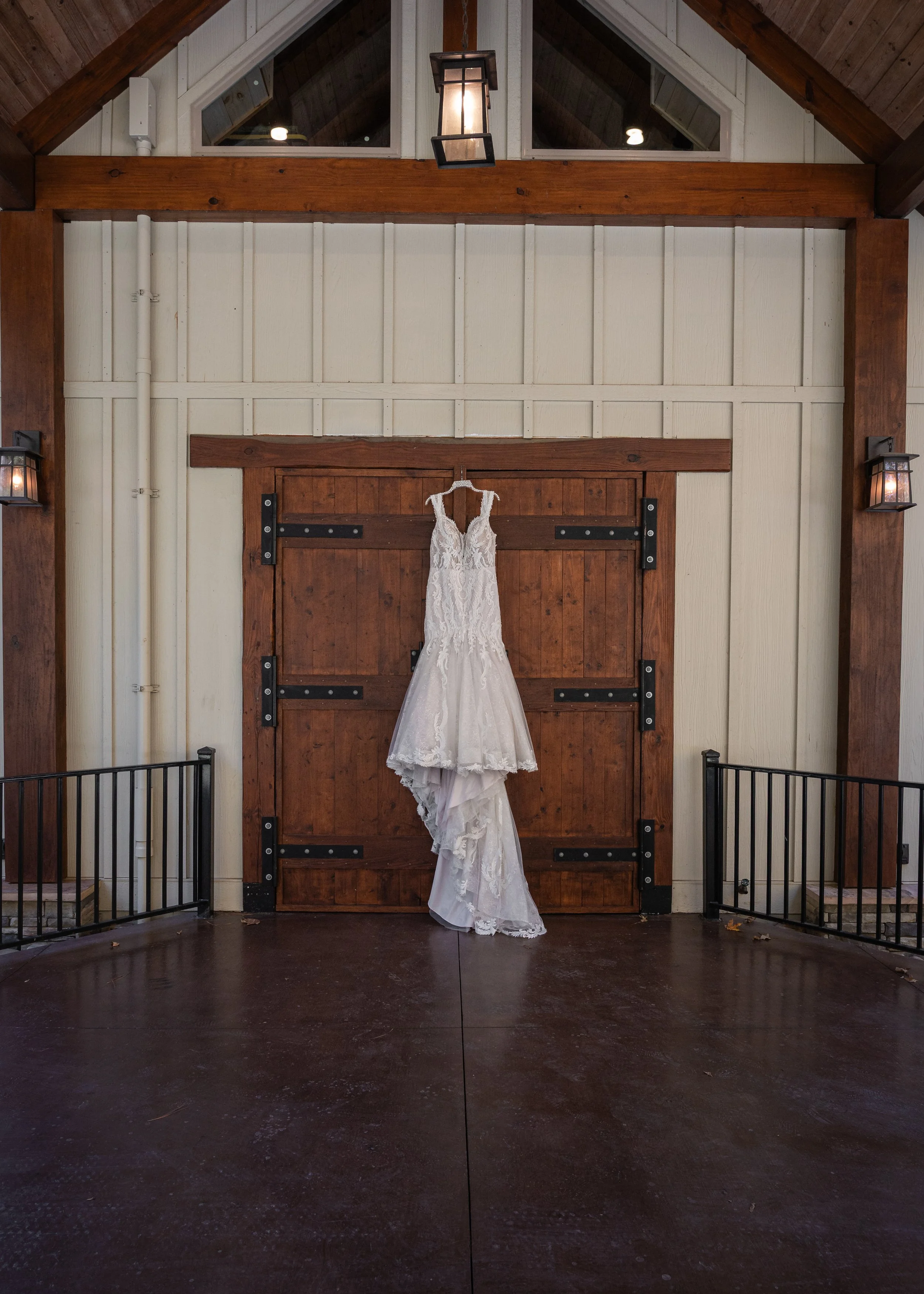 Front door at Hiwassee River Weddings with wedding dress hanging