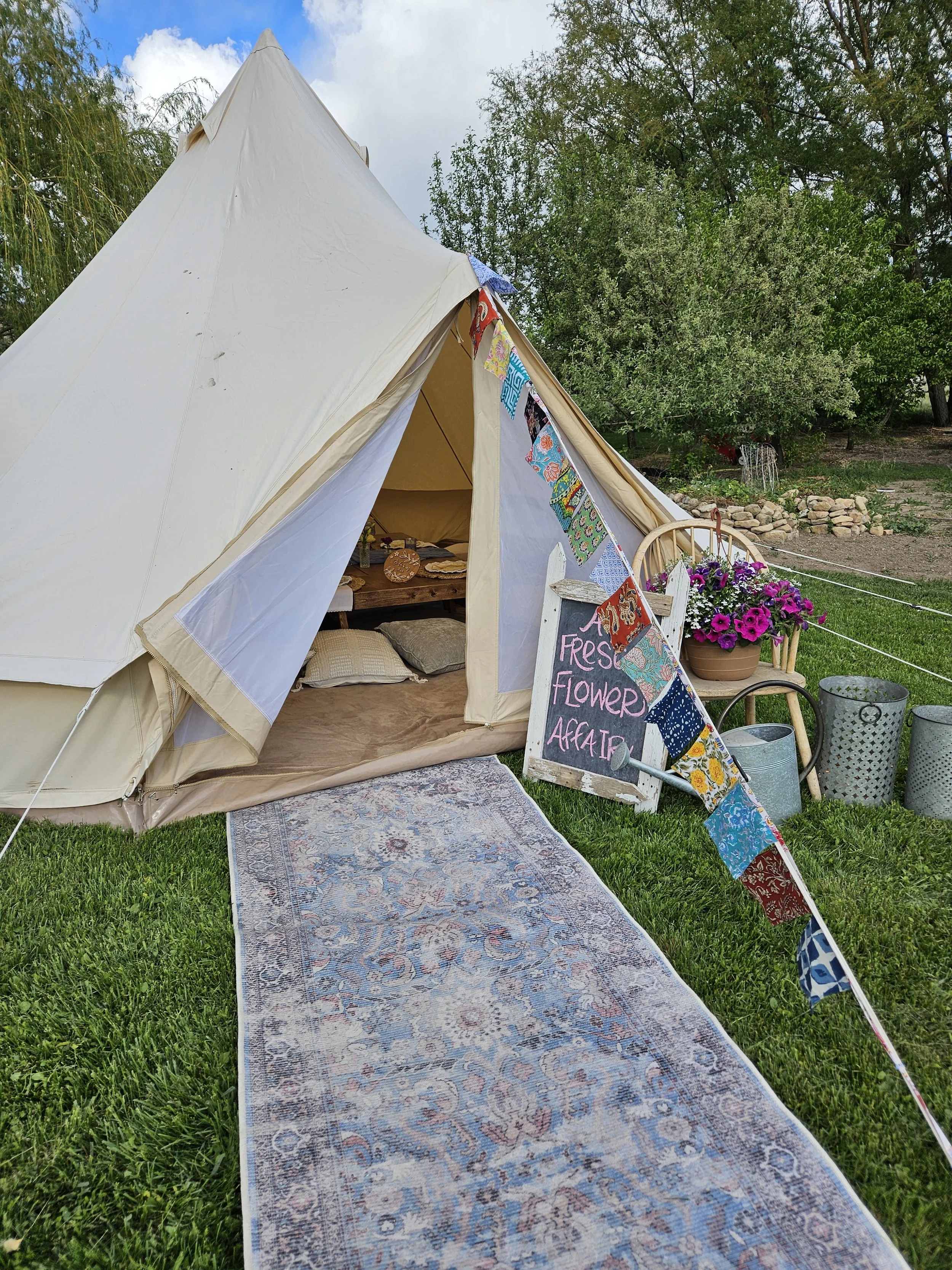 flower farm picnic in the bell tent