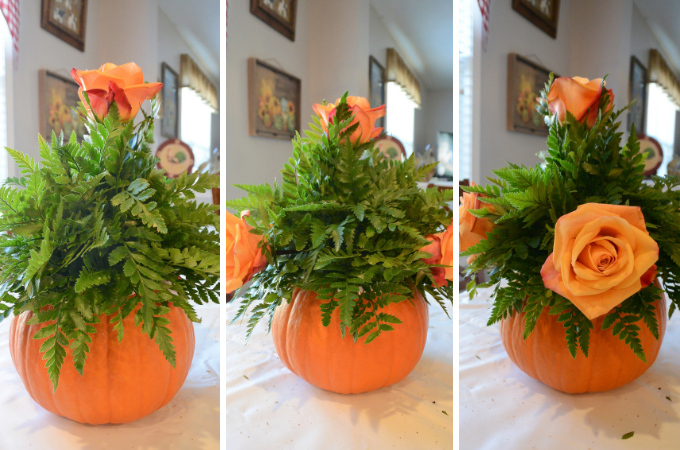 adding first flowers to flower arrangement