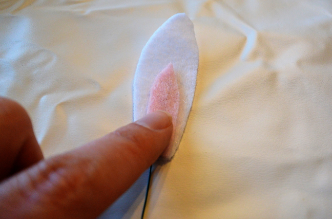 pressing pink onto bunny ear