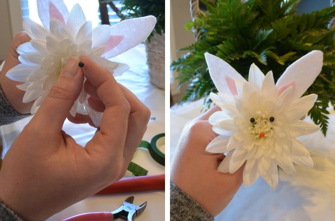 pushing pins in to make the eyes and nose