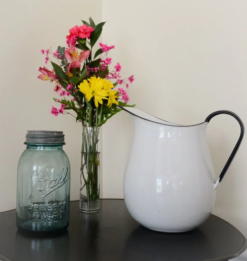 finished arrangement with mason jar and pitcher