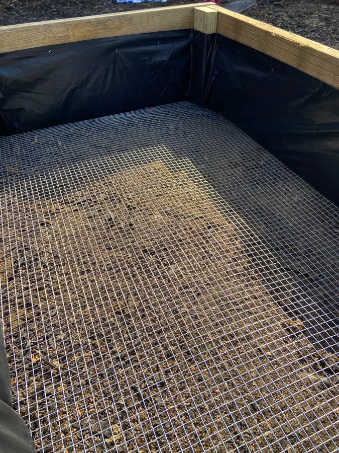 up close of plastic lining and chicken wire