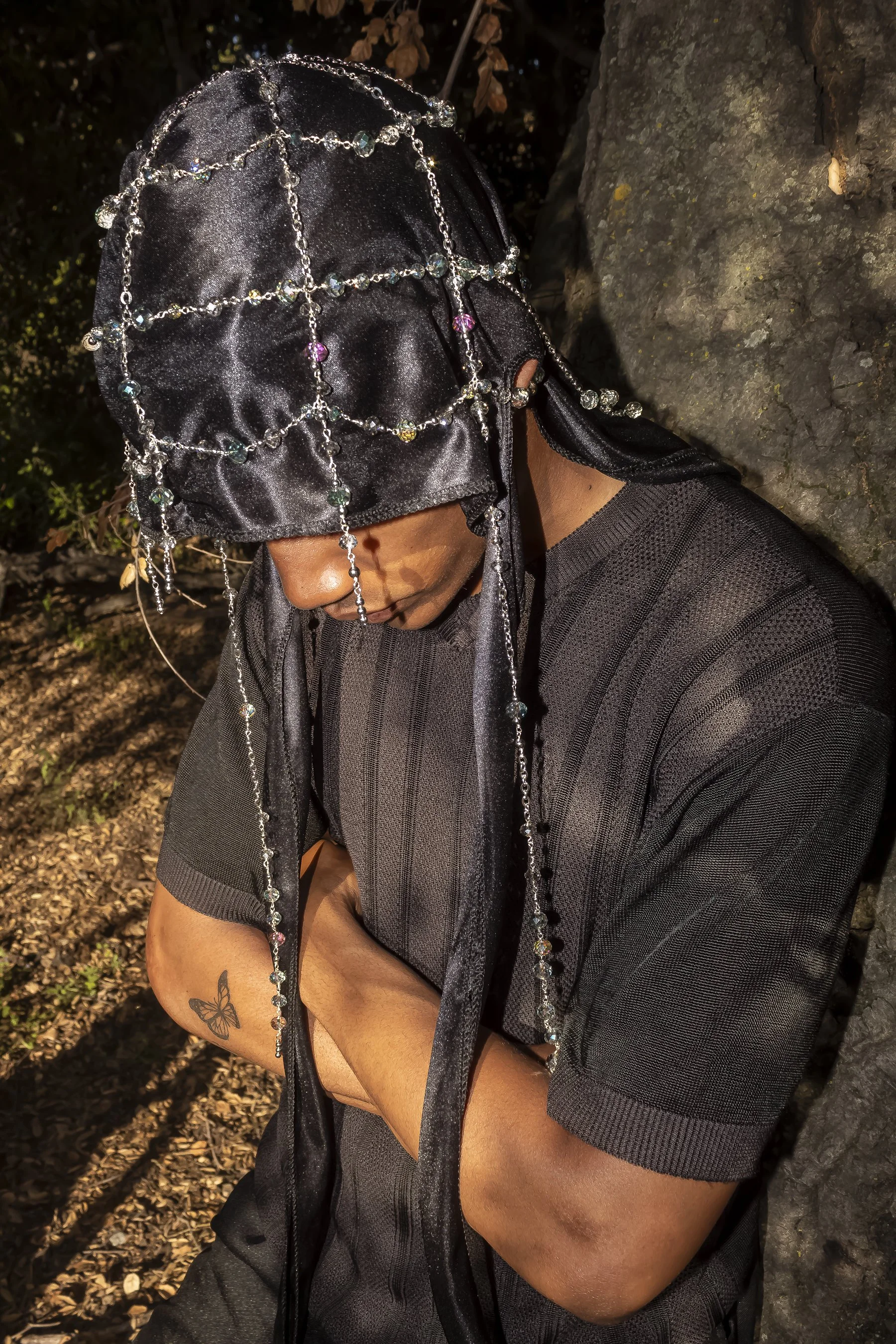 "Dew Dropped Web: A Crystal Durag" shot by Luca