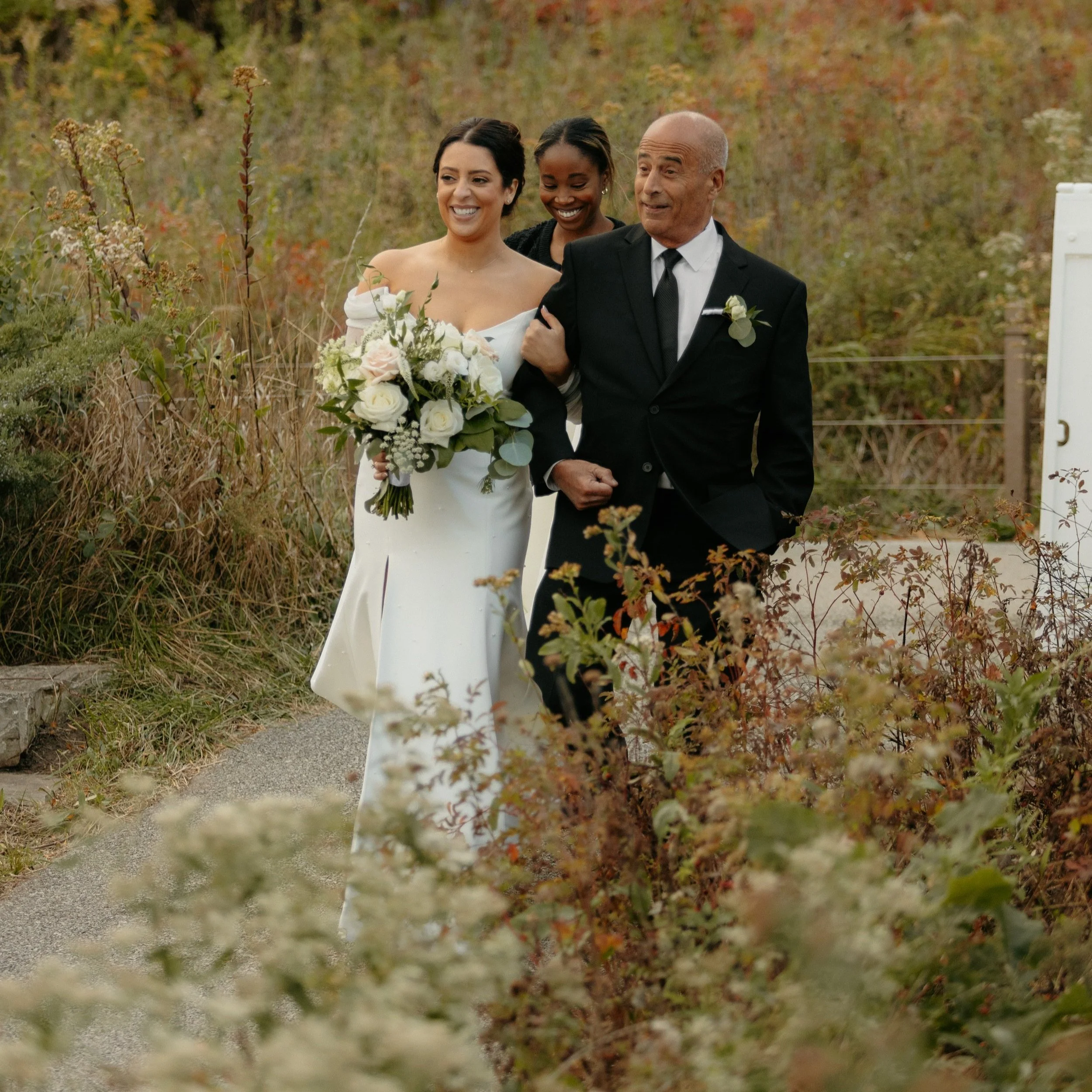Chicago wedding planner supporting bride during ceremony processional