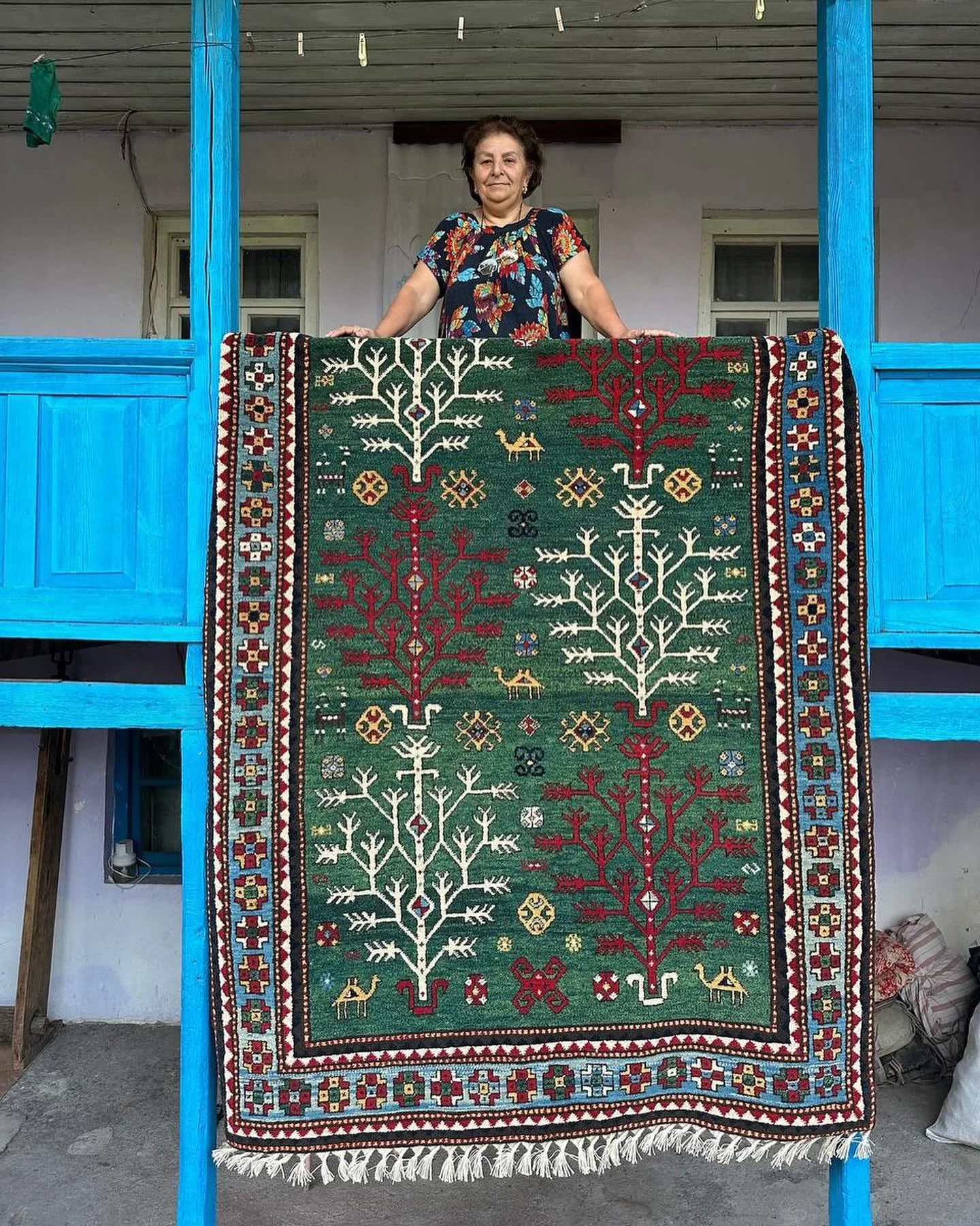 Freshly shipped off to customers who ordered this classic Tree of Life design with an emerald green field. Mehriban is an amazingly skilled weaver who always asks us for large rug designs. She&rsquo;s currently working on a new Akstafa rug, coming so