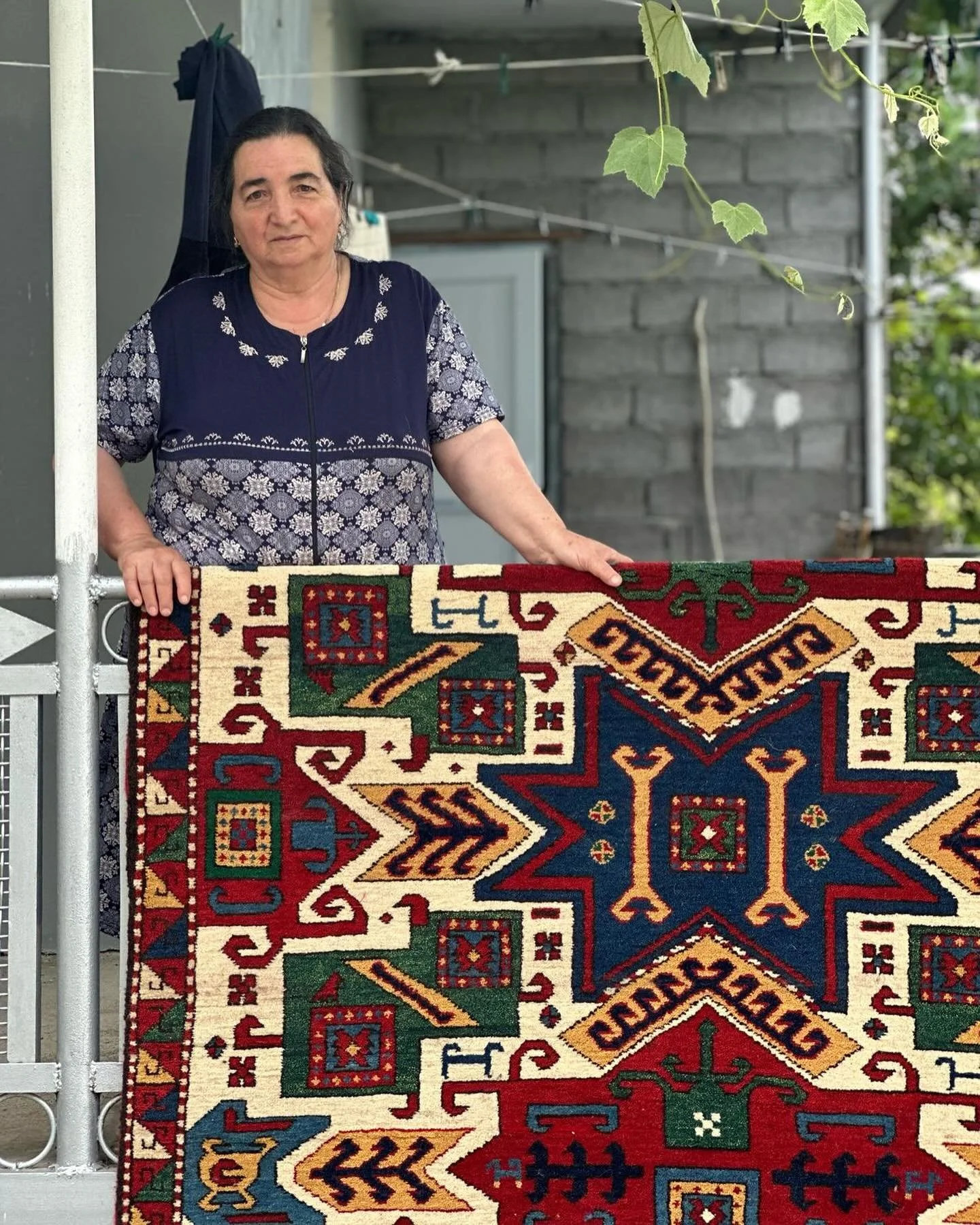Zemfira with a Star Kazak fresh from the loom. Working with Fatma, it took them couple of months to finish. In Kosalar weaving is social, a way of spending time together. We are so happy Fatma is weaving again after more than a year in mourning. The 