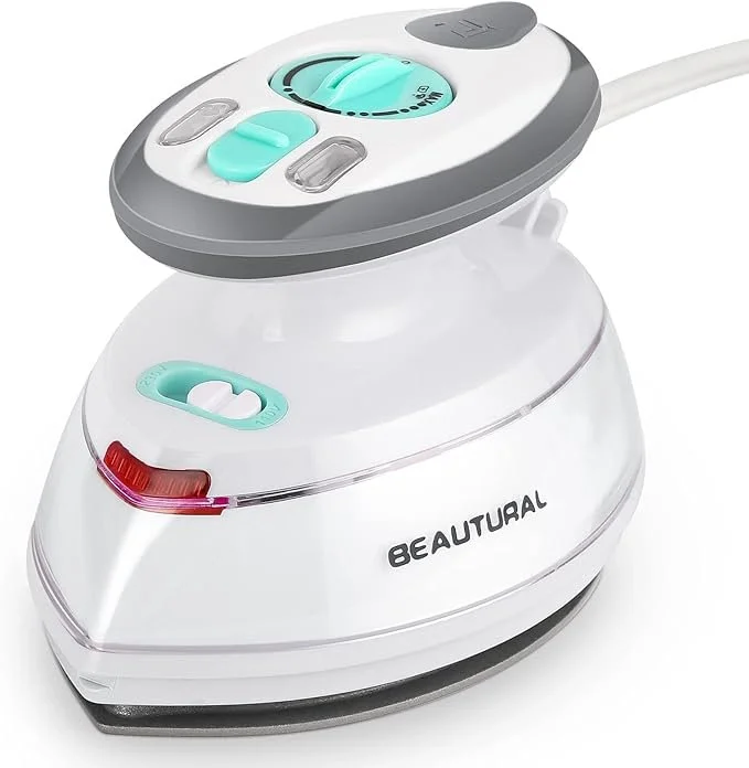 A steam facial steamer with control buttons, a water indicator, and the brand name BEATURAL.