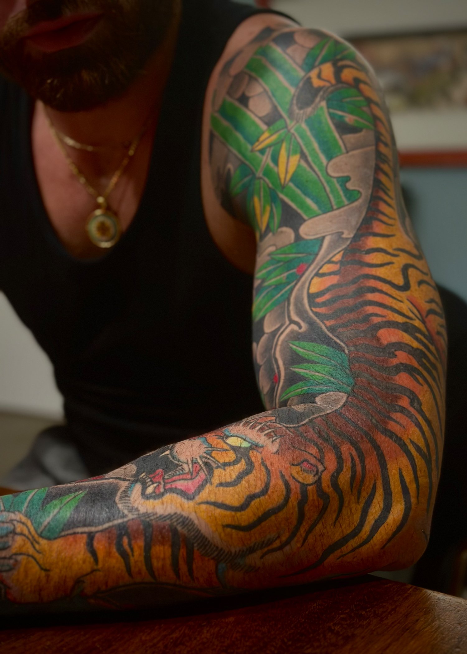 Tiger & Bamboo Japanese Tattoo — Full Sleeve, Fort Lauderdale | Traditional Japanese full sleeve featuring a tiger with bamboo. Outline by machine; all shading and color applied by hand using tebori. Healed.