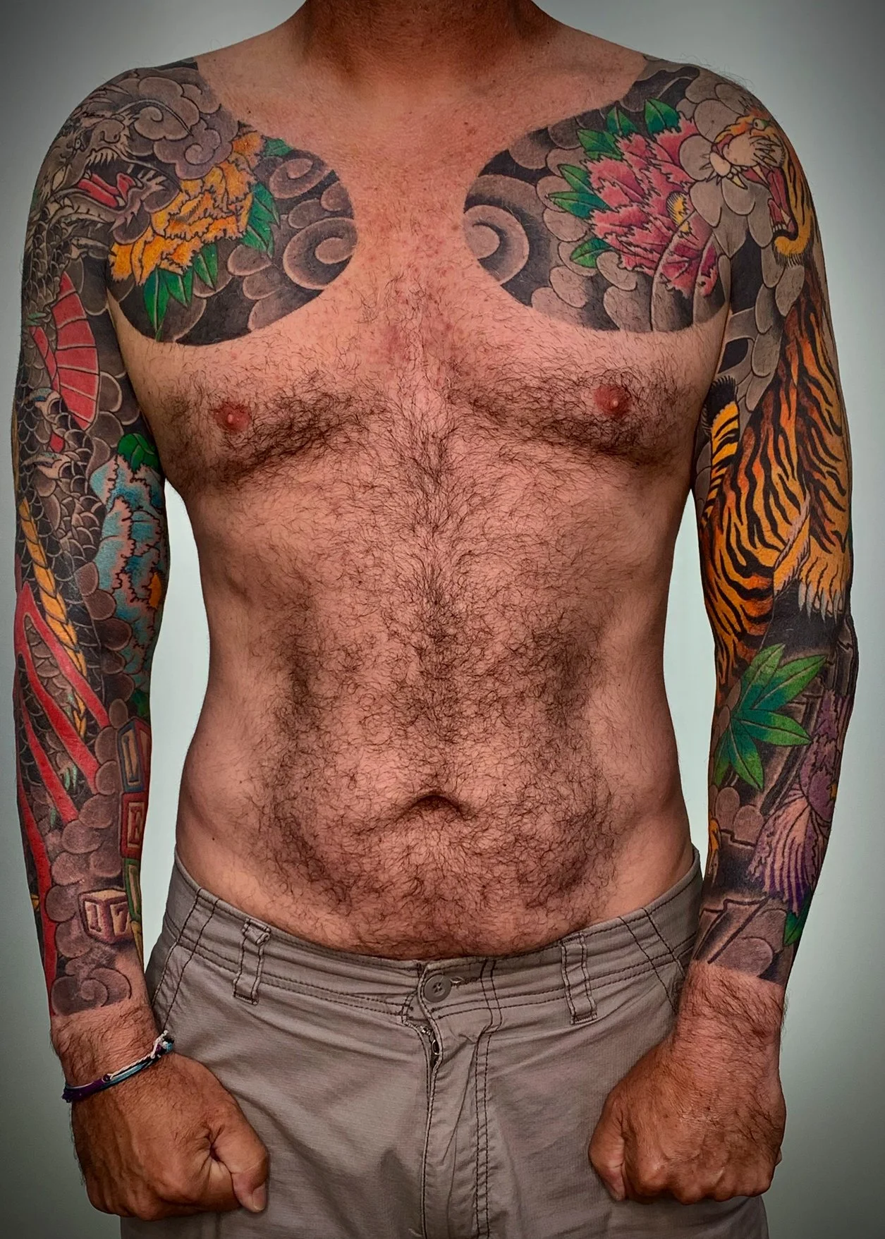Traditional Japanese irezumi sleeve and chest tattoo featuring dragon and tiger and peony motifs by Horiyou 彫陽 — ShinouTattoo Fort Lauderdale Florida