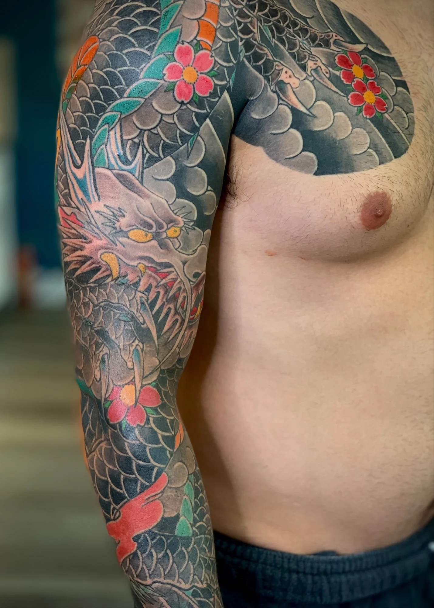 Dragon & Cherry Blossom Japanese Tattoo — Full Sleeve & Chest Panel, Freehand, Fort Lauderdale | A freehand full sleeve and chest panel featuring a dragon with cherry blossoms. Entirely machine work. Healed.