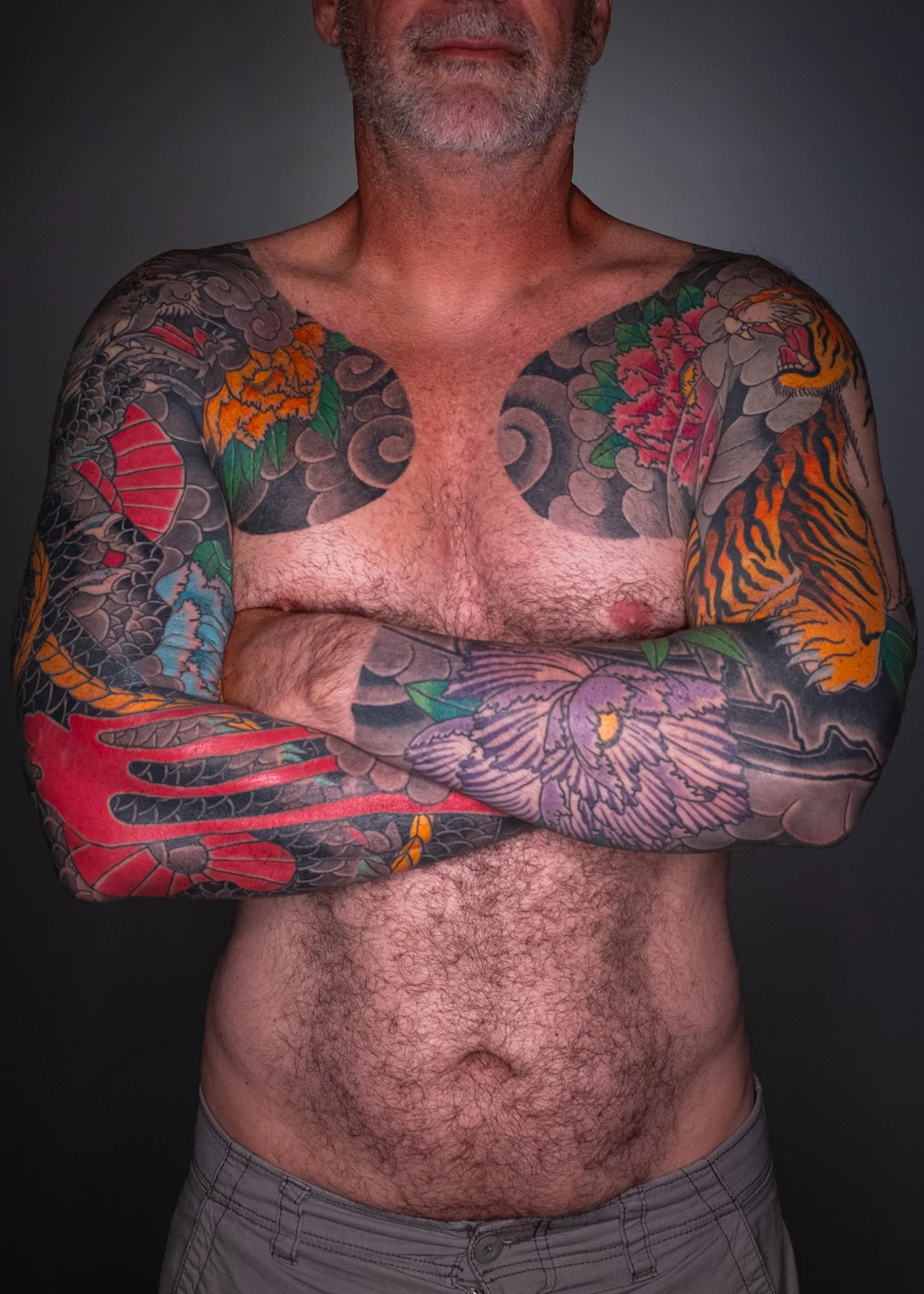 Traditional Japanese irezumi sleeve and chest tattoo featuring tiger and peony motifs by Horiyou 彫陽 — ShinouTattoo Fort Lauderdale Florida