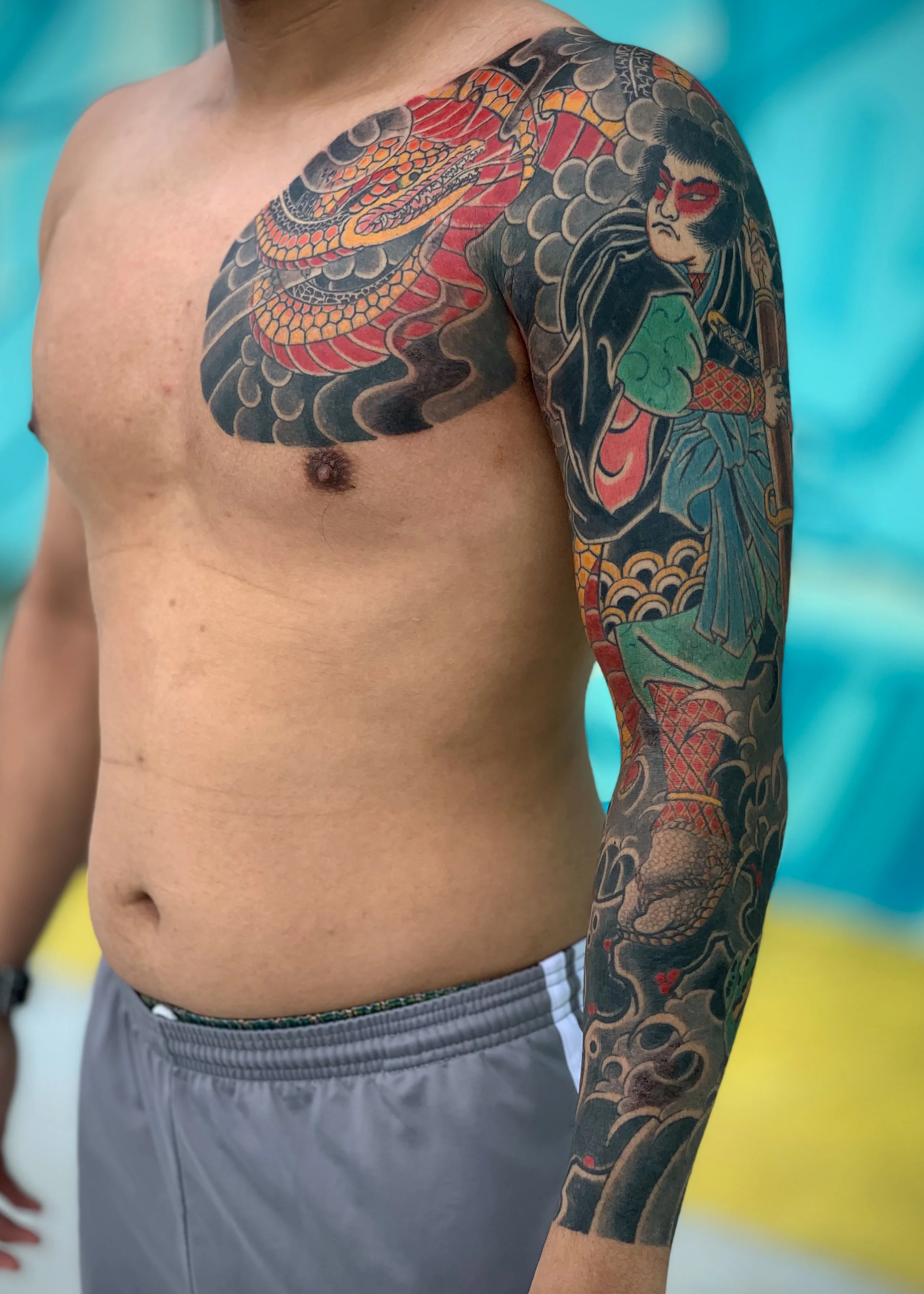 Jiraiya & Snake Japanese Tattoo — Full Sleeve & Chest Panel, Fort Lauderdale | A full sleeve and chest panel depicting Jiraiya, the shapeshifting hero of Japanese folklore, with a snake. Outline by machine; shading and color by hand using tebori. Hea