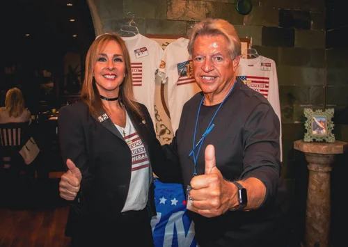 Trumpsterz hosts greeting guests