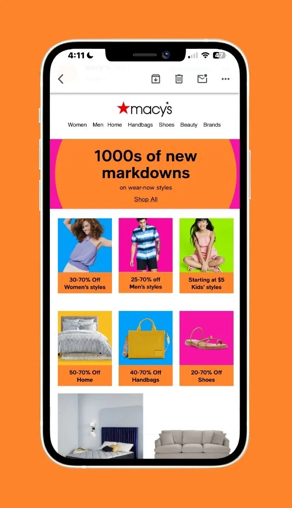 Screenshot of Macy's mobile shopping app showing discounts on women and men's clothing, kids' clothing, home goods, handbags, and shoes, with colorful images and promotional text.