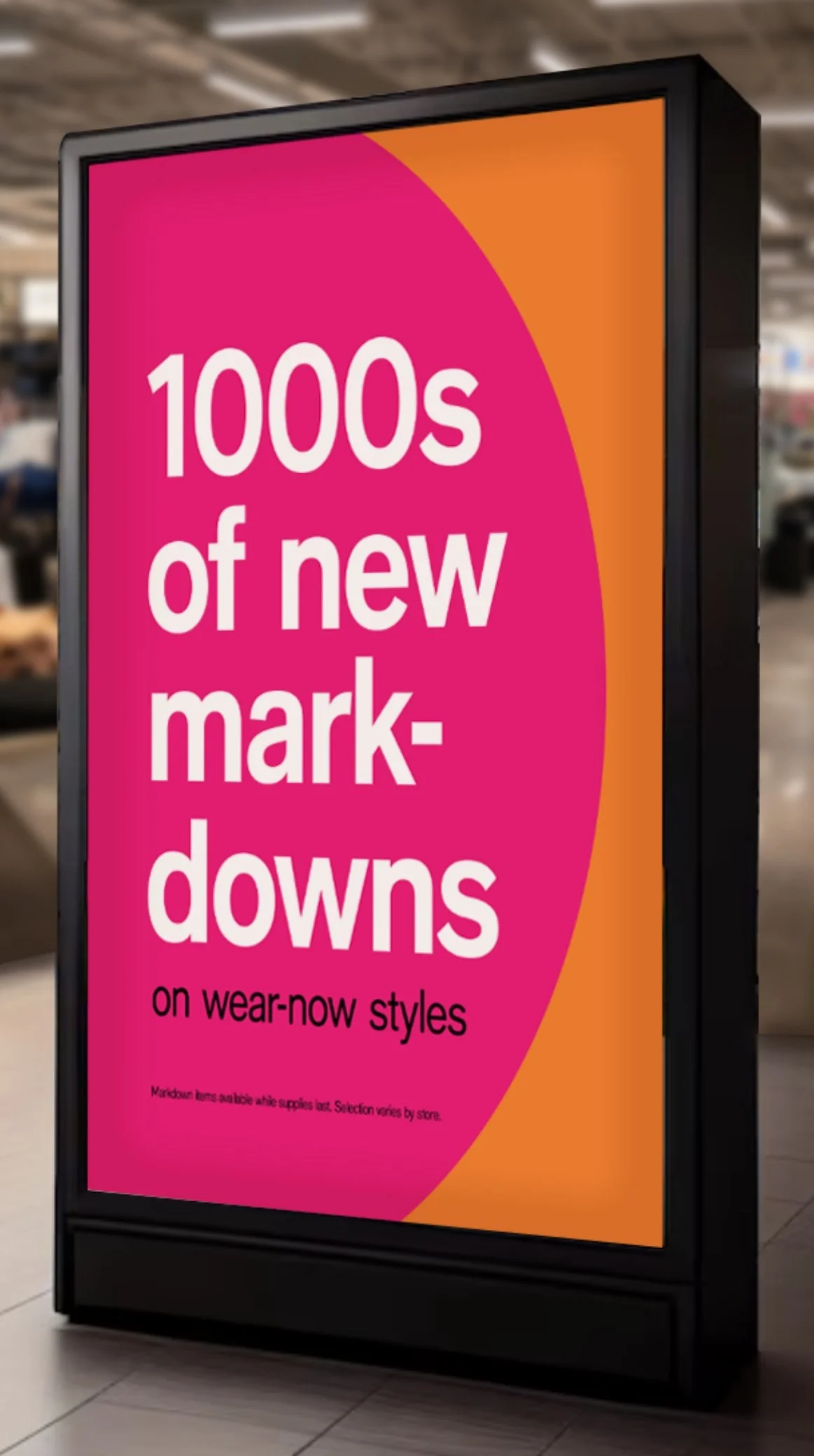 Digital store signage with bold pink and orange design, displaying text about discounts on wear-now styles.