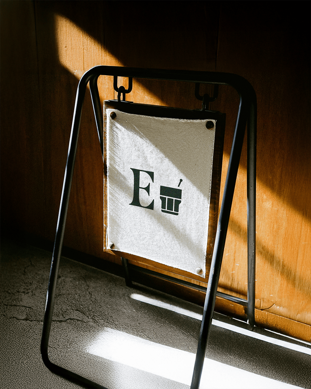 Branded signage from Evergreen Bar Company featuring the logo