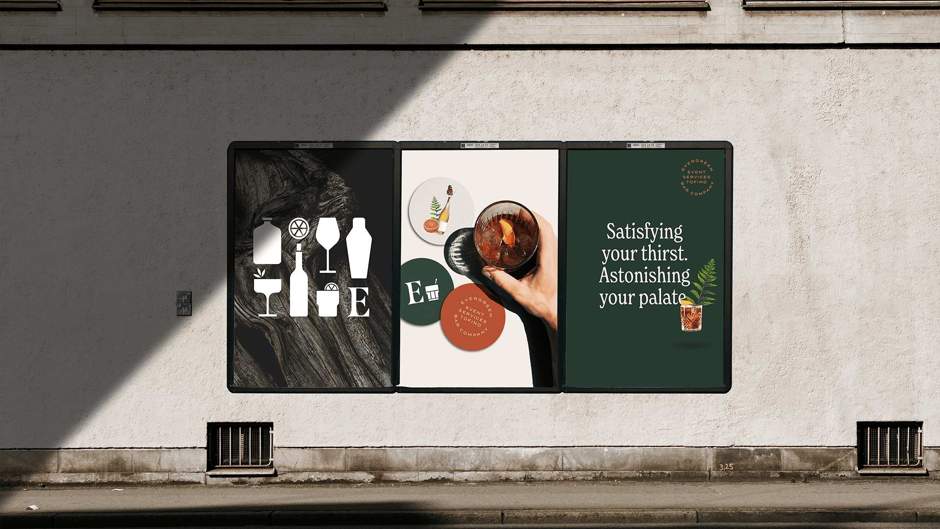 Outdoor poster mockups for Evergreen Bar Company showcasing brand messaging, illustrations, and cocktails
