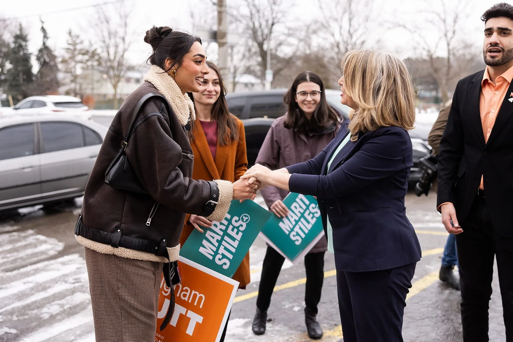 Ontario NDP campaign moment showing a Marit Stiles engaging directly with voters