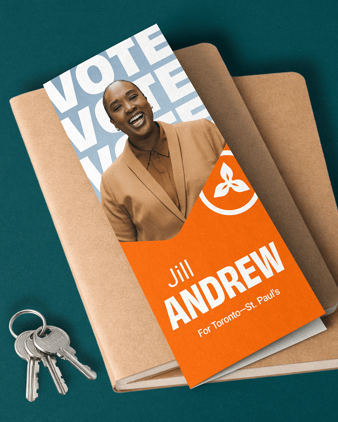 Ontario NDP campaign brochure featuring candidate Jill Andrew, using bold typography, bright orange branding, and the trillium mark