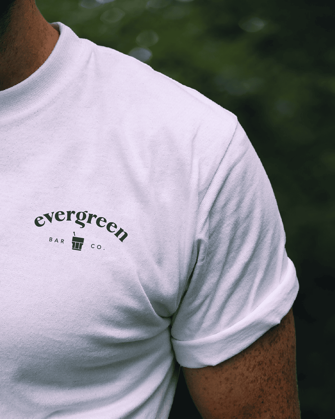 Branded T-shirt from Evergreen Bar Company featuring the logo