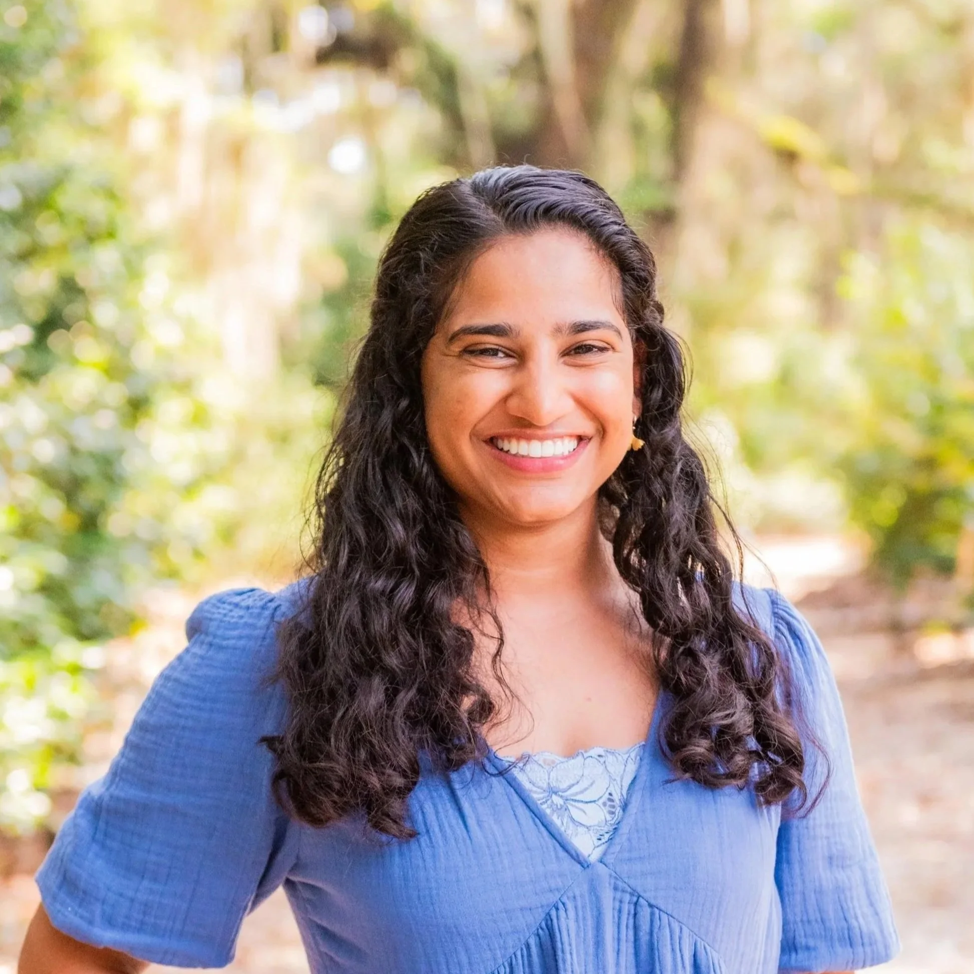 Headshot of May Hart