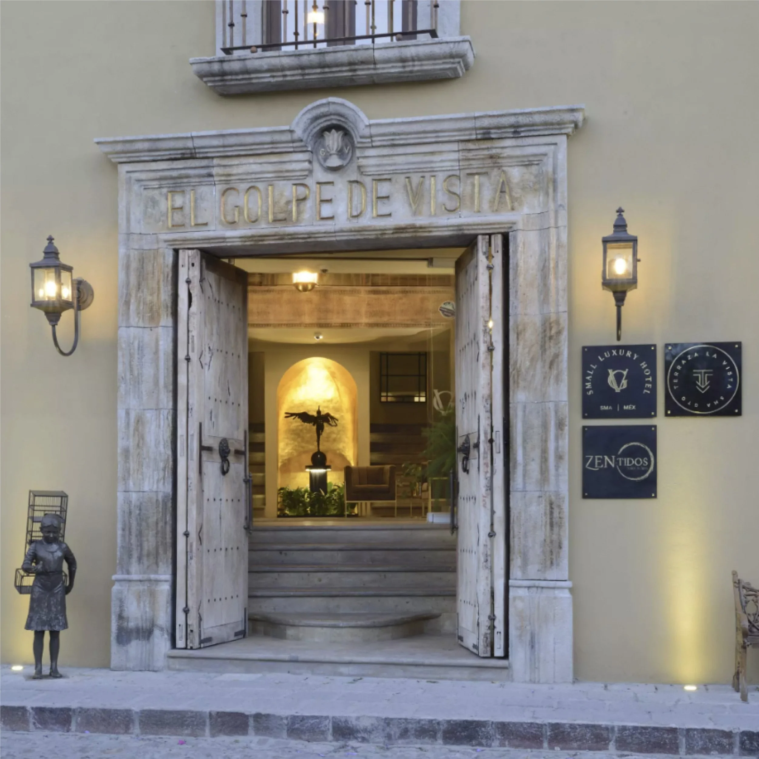 Hotel entrance with logos (Hotel, restaurant and Spa)