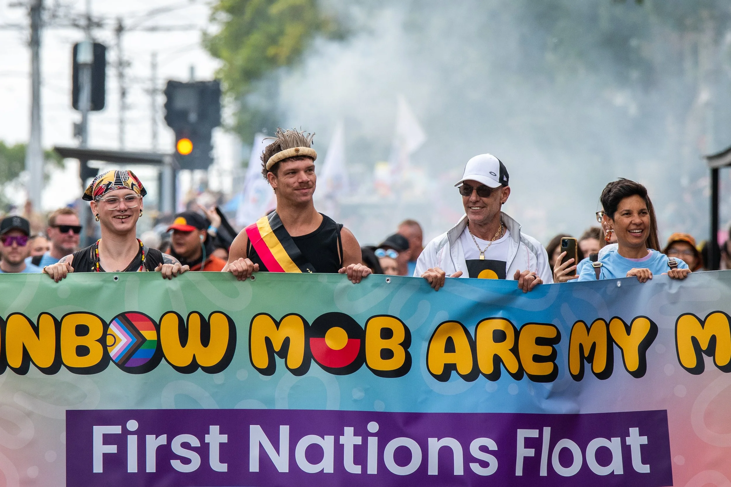 Rainbow mob/First Nations float.