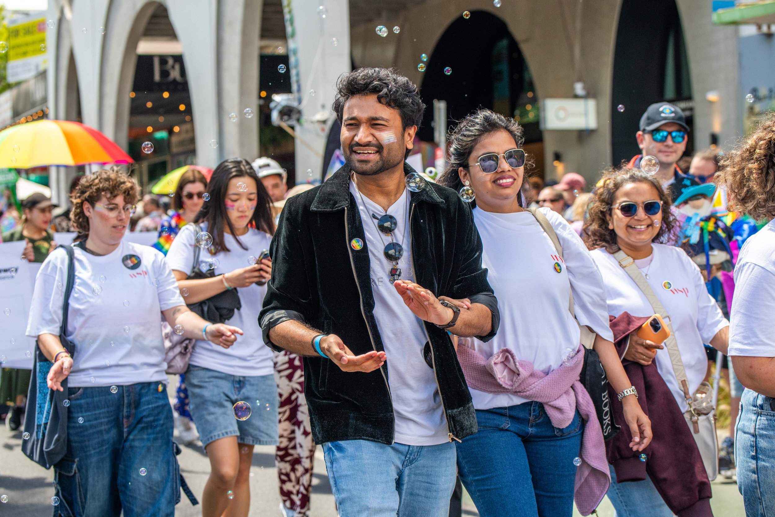 A human claps as they march.