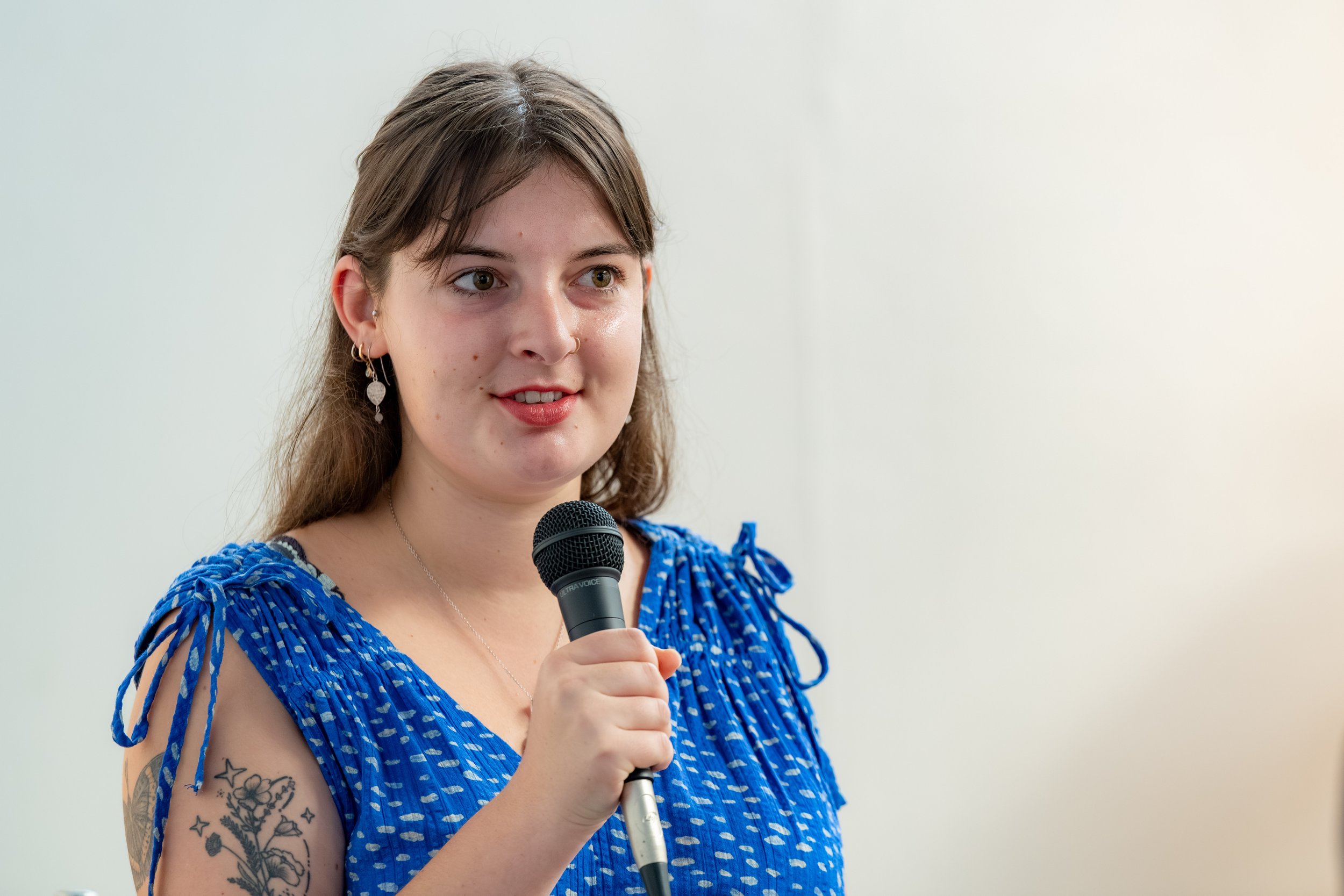 Nina Fitzsimmons gives a speech.