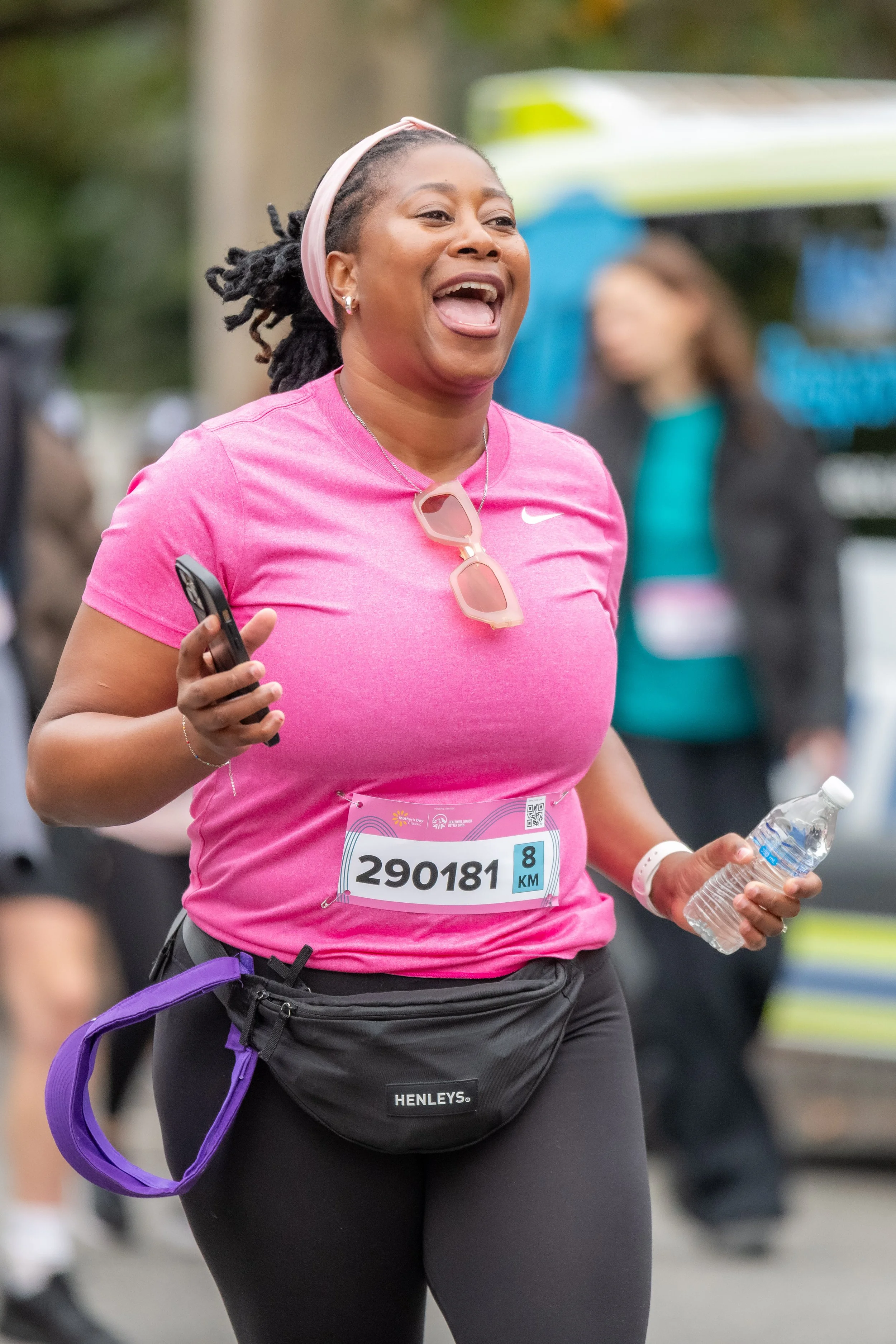 A racegoer in a pink tee.