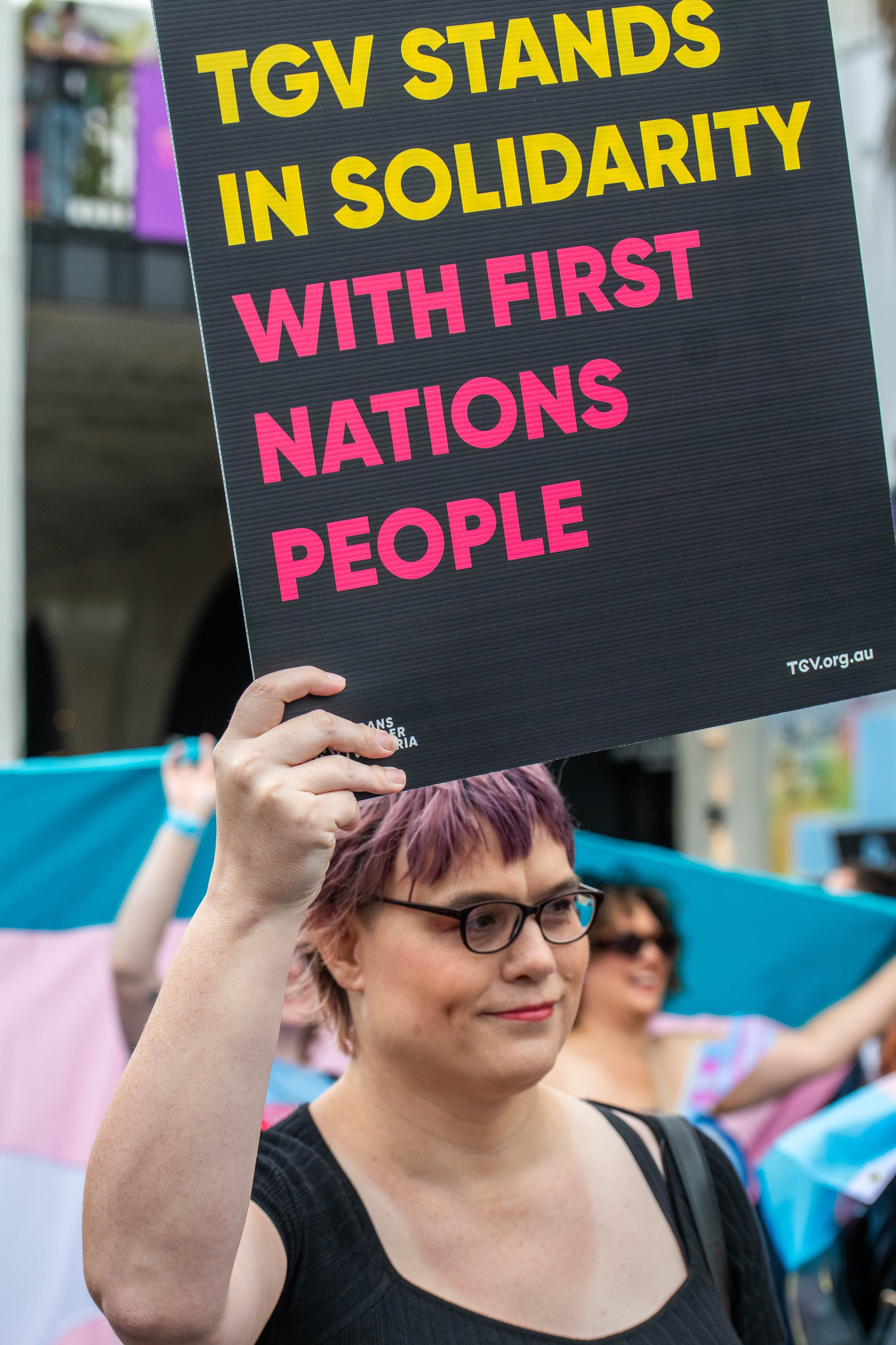 A placard "TGV stands in solidarity with First Nations people".