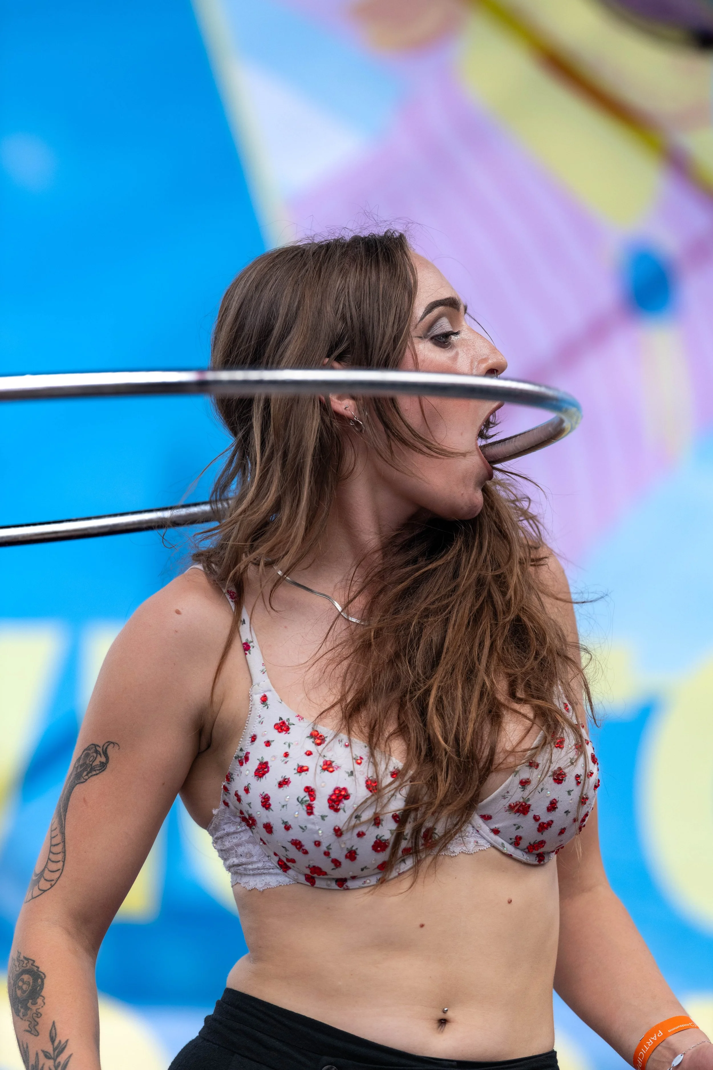 Saskia Gallasch hoops between their mouth.