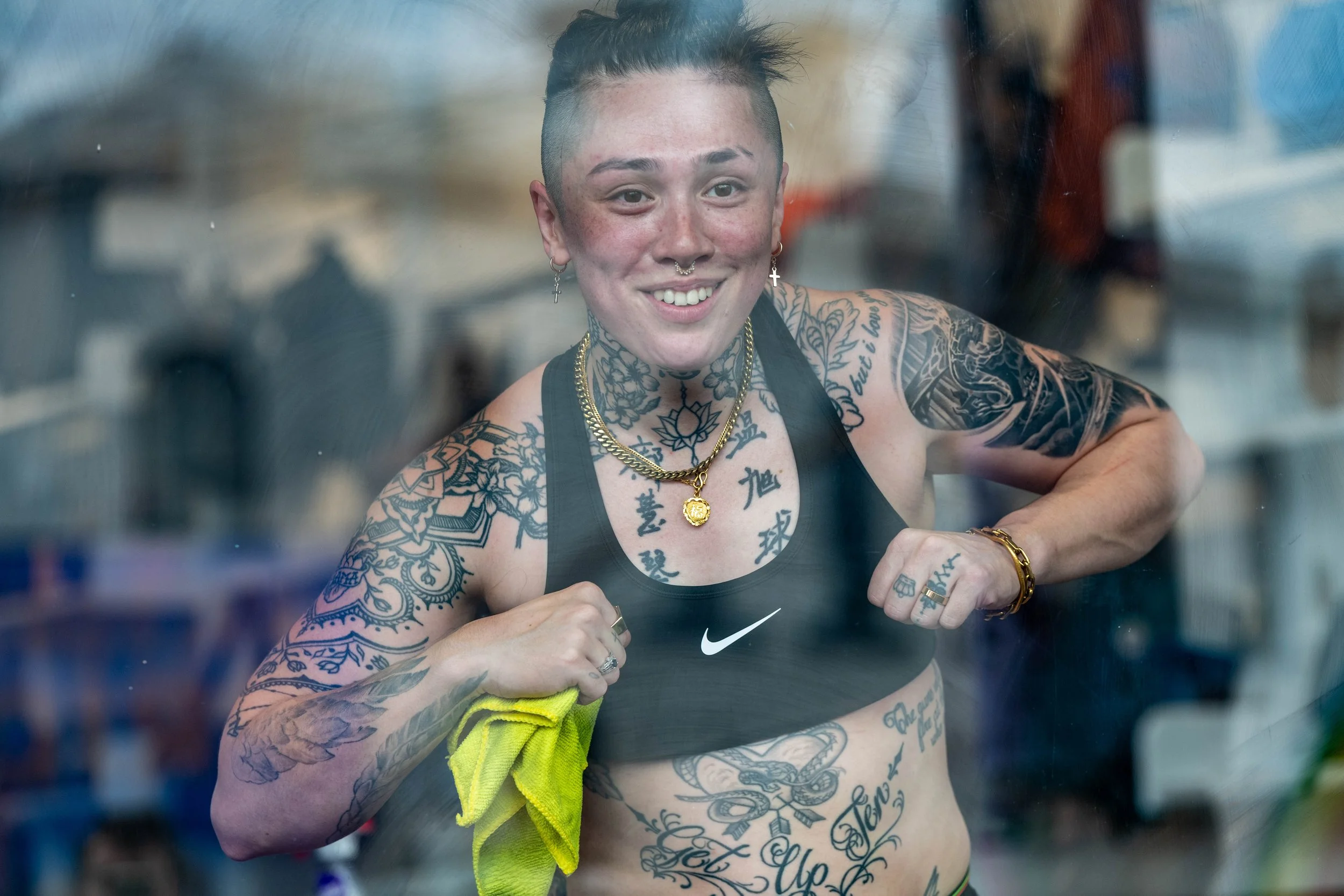 Daddy Charles dances behind a glass window.