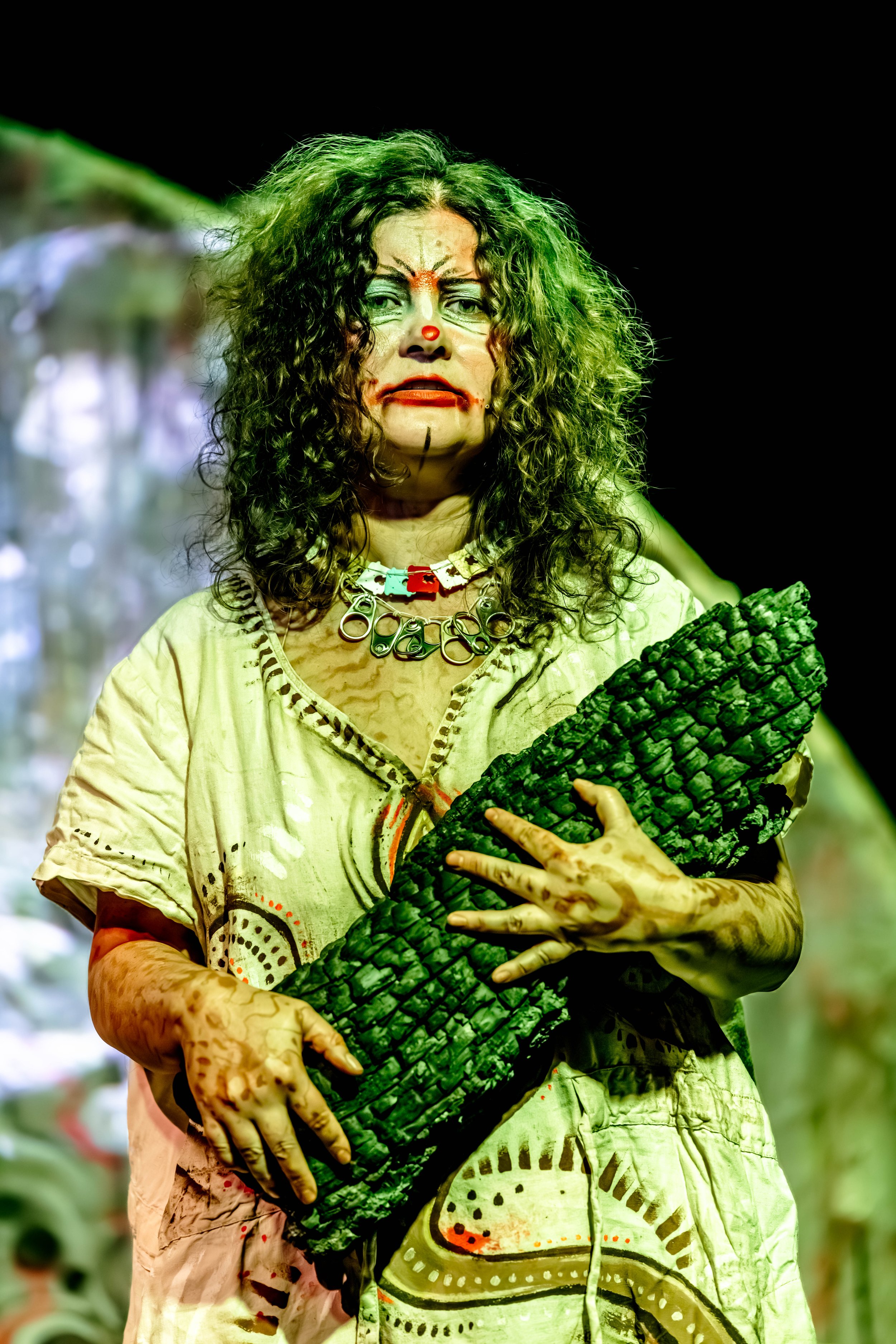 Jessie Ngaio holds a burnt log.