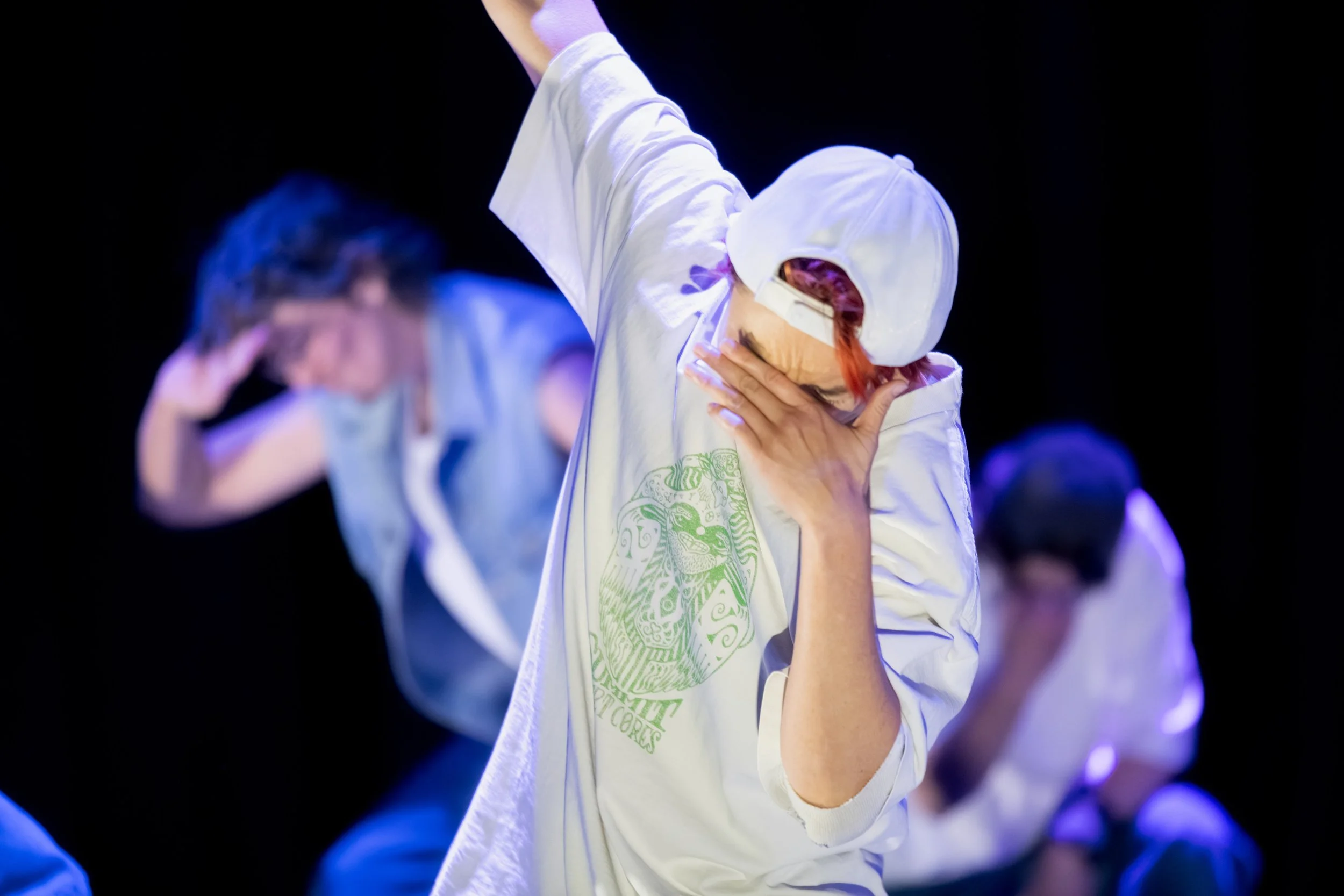 One dancer is "dabbing".