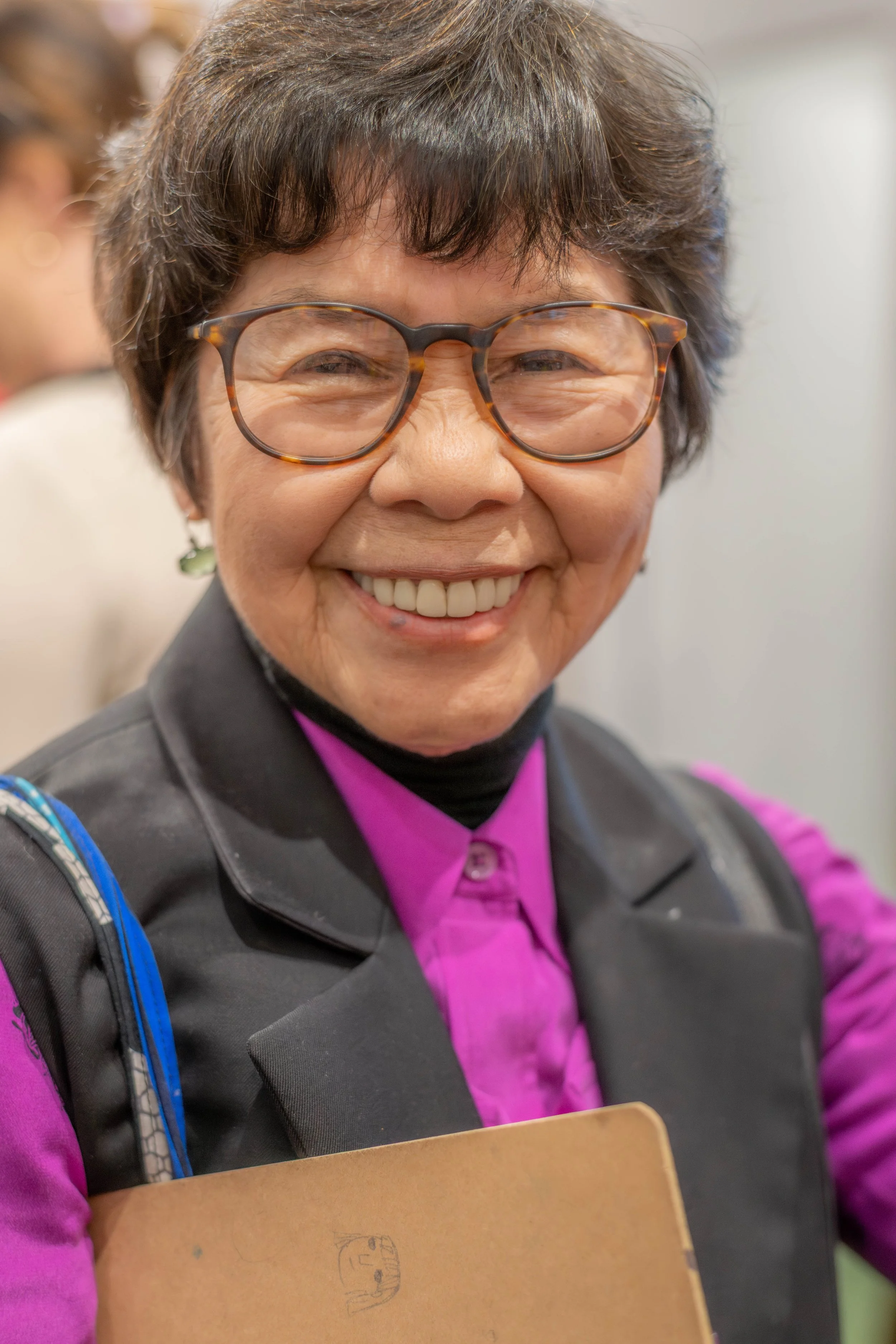 An author smiles for the camera.