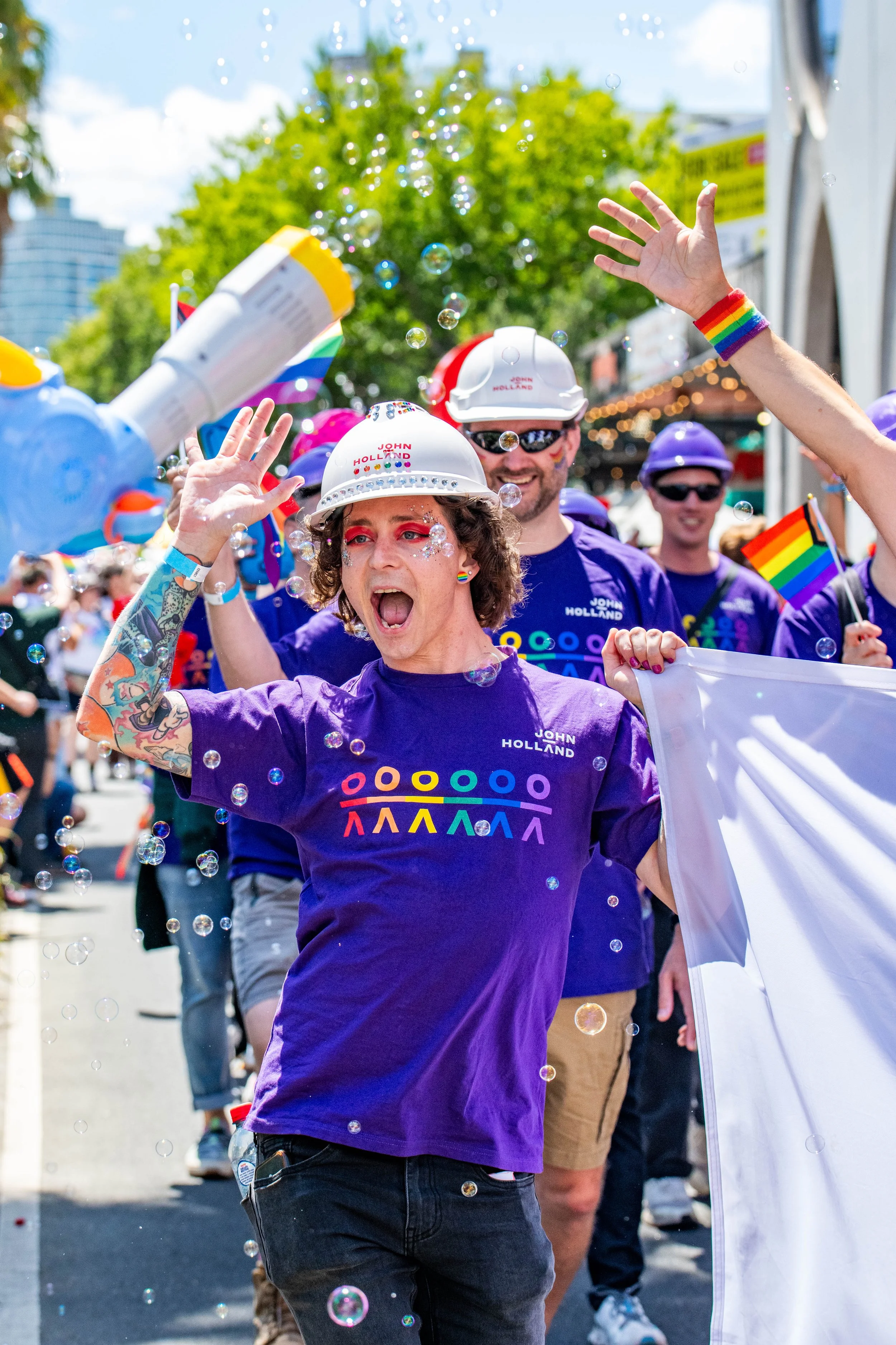 A human dances through bubbles.