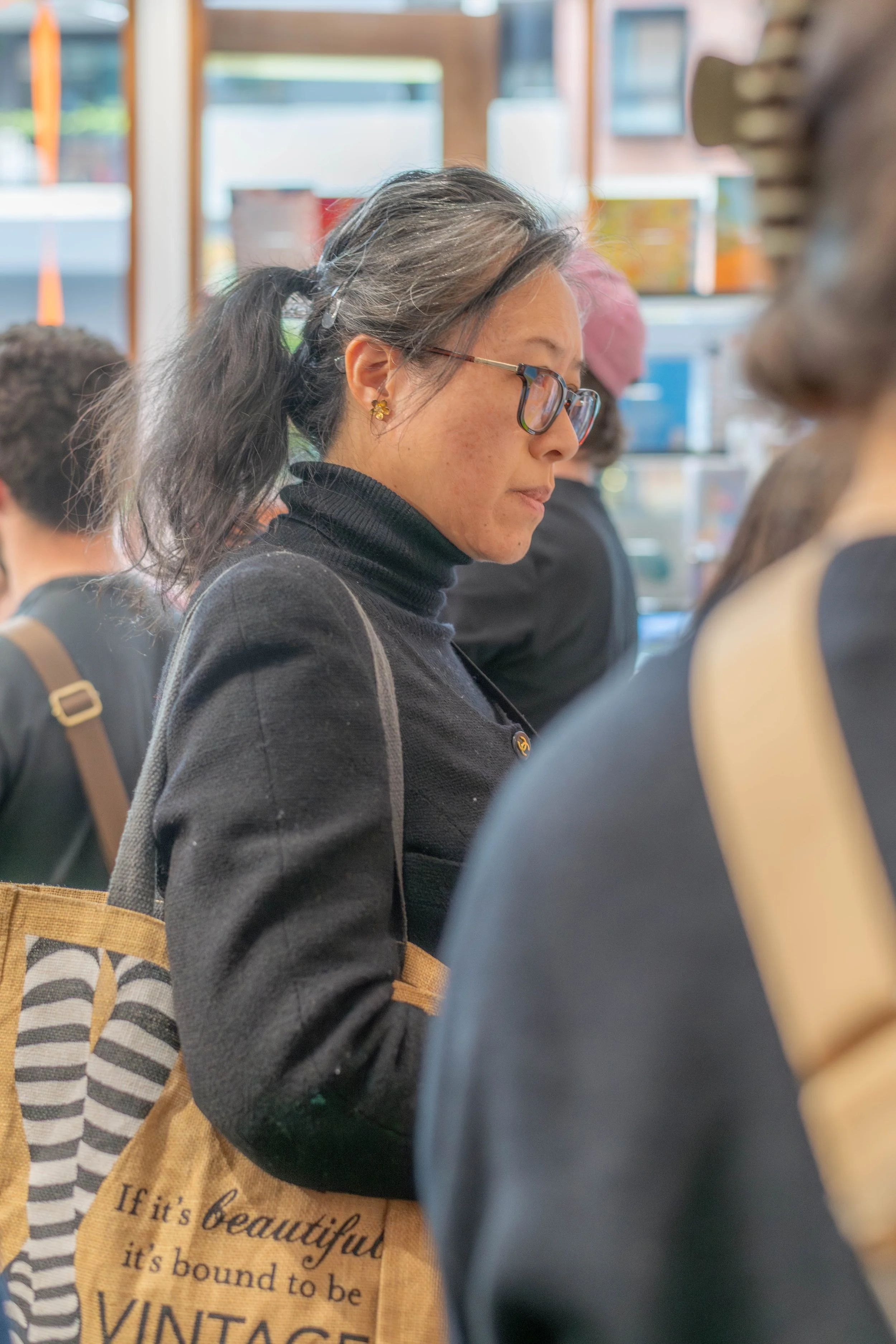 A human stands amongst many.