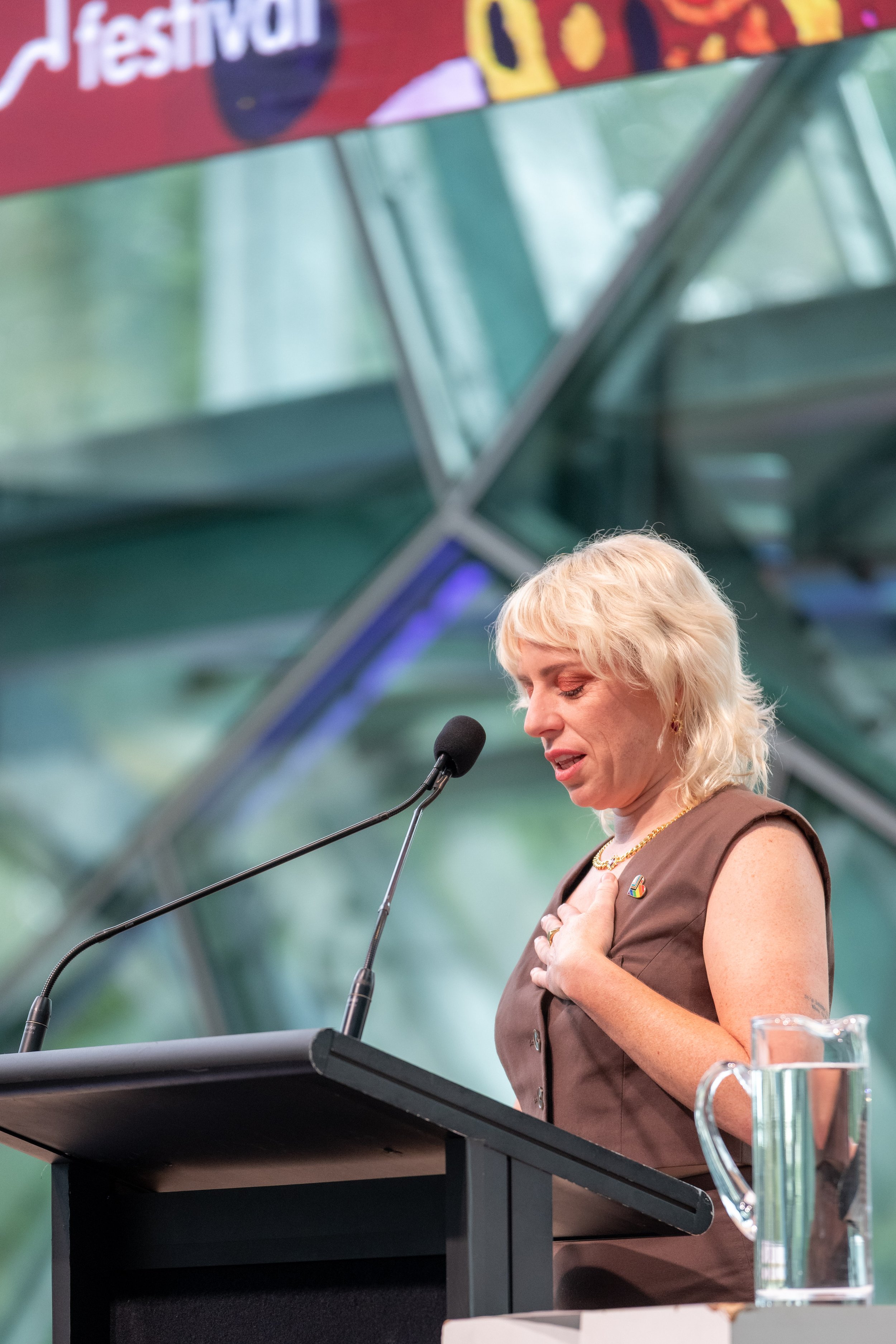 Renee Thompson places a hand to her heart.