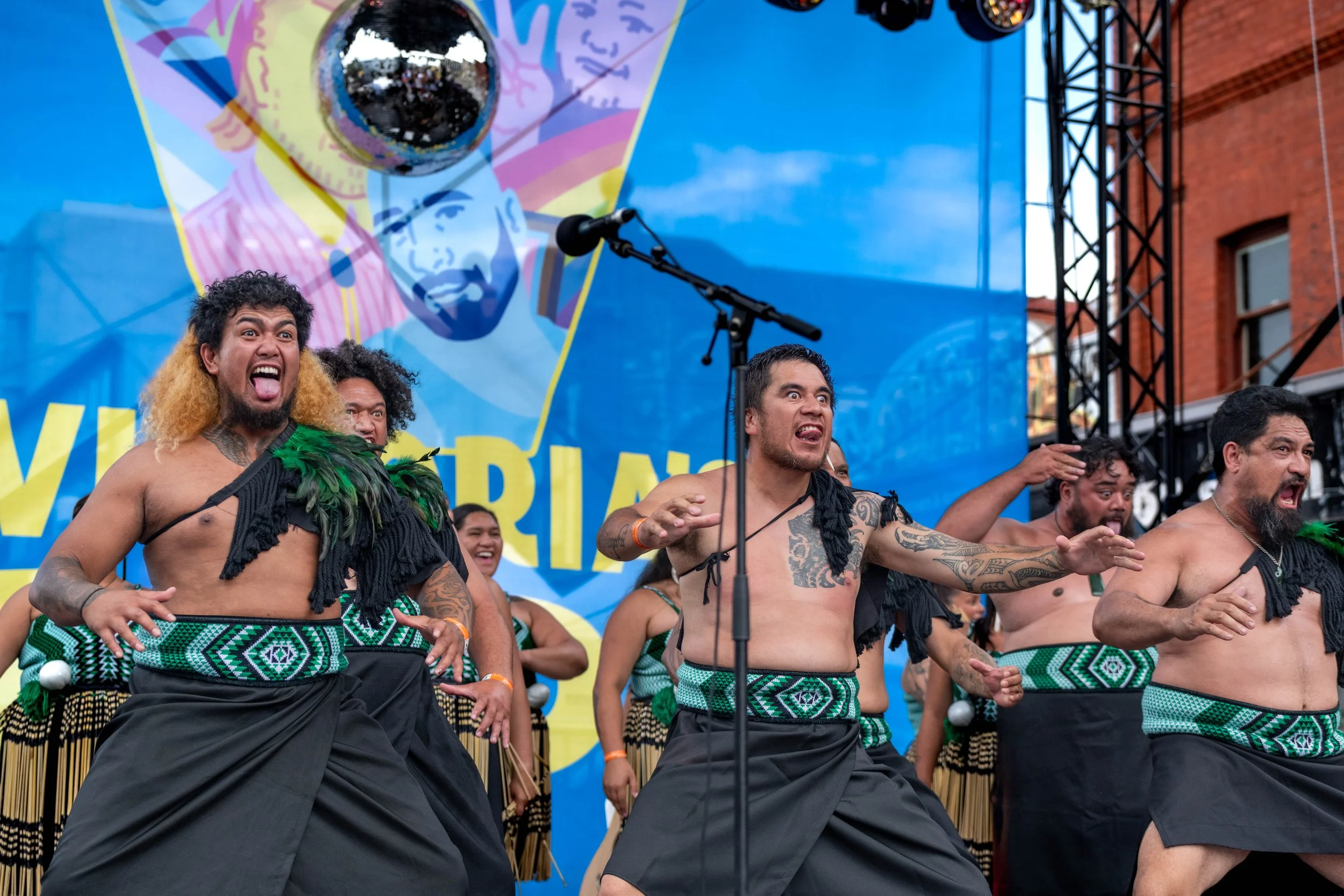 Many dancers from the Pacifique X Fiafia Pride Celebration dance a haka.