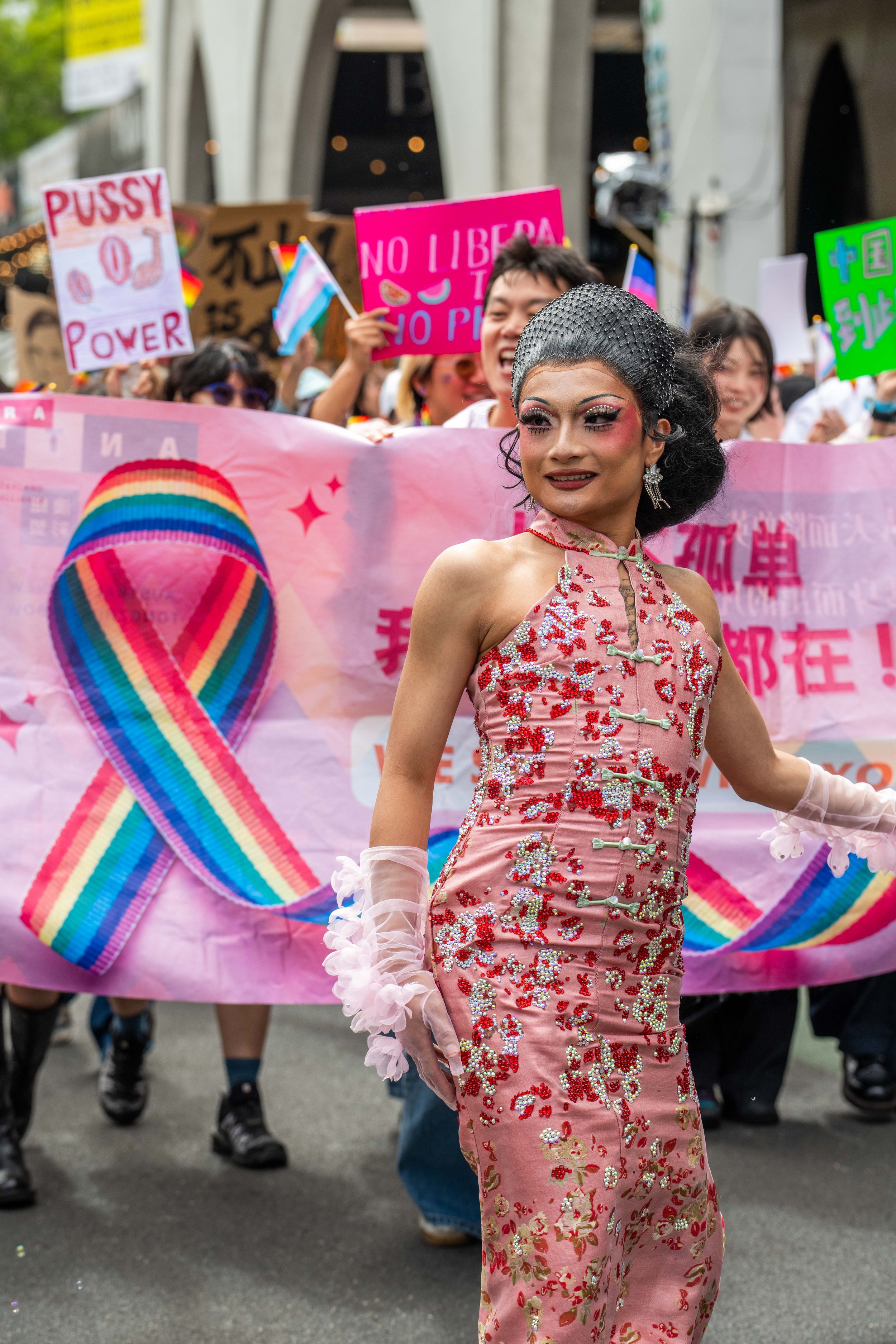 A human in a pink dress.