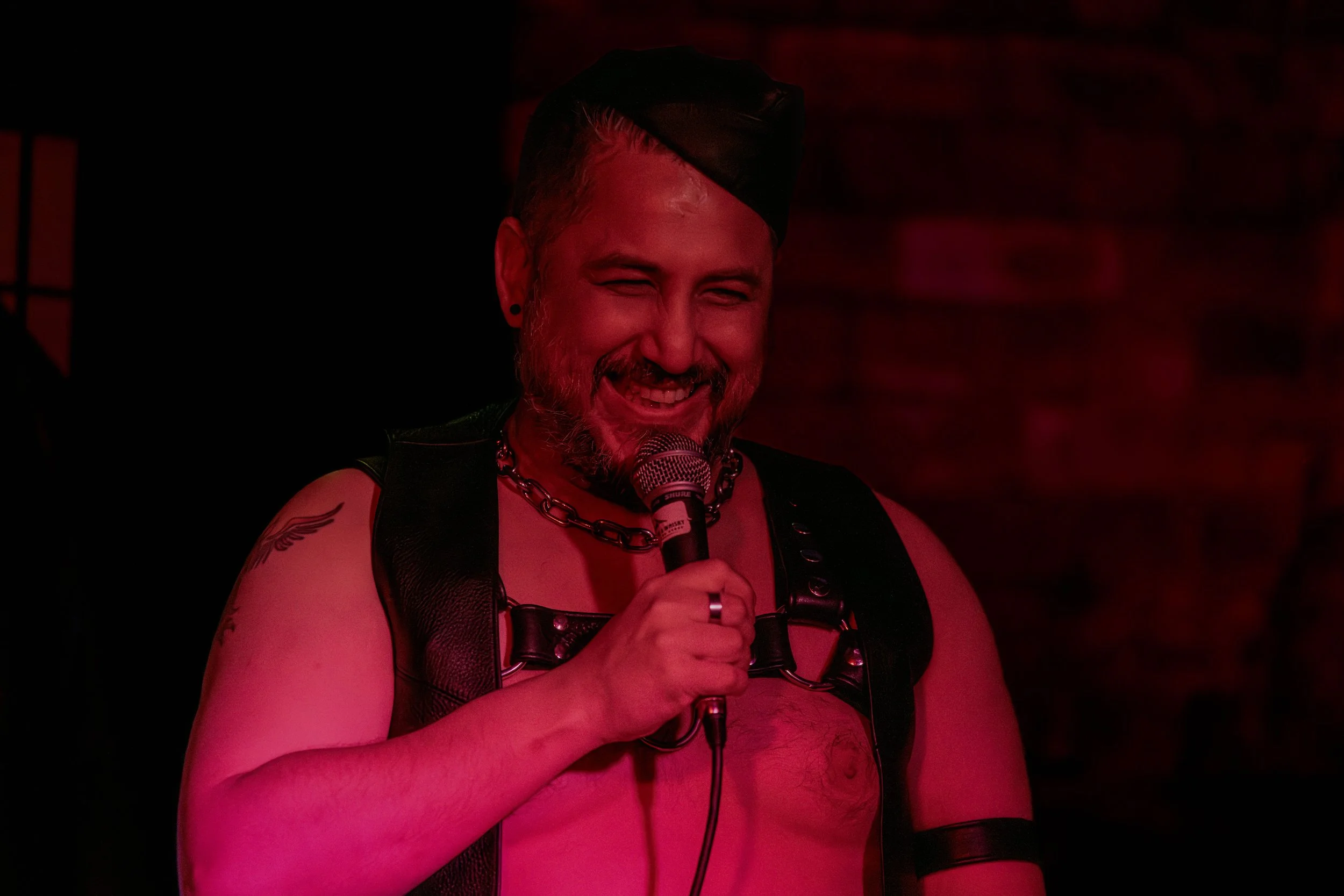 Andrew Rose smiles at the audeince.
