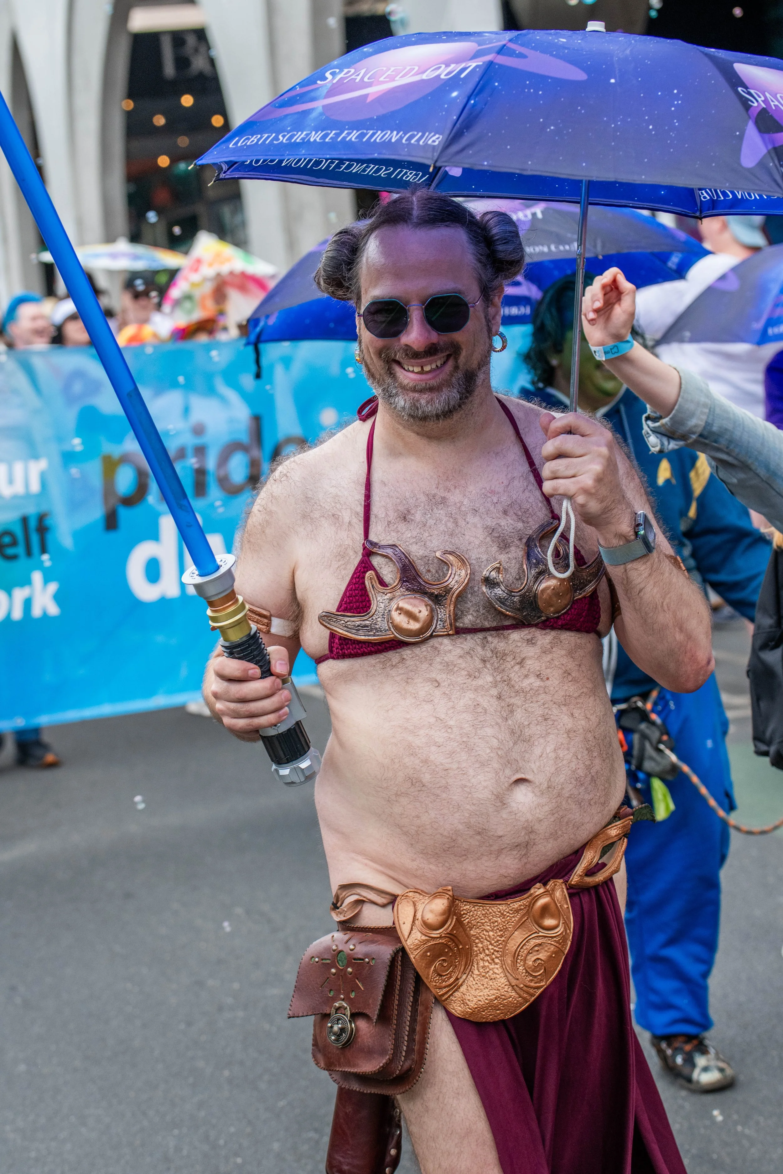 A human in a Princess Leia costume poses for the camera.