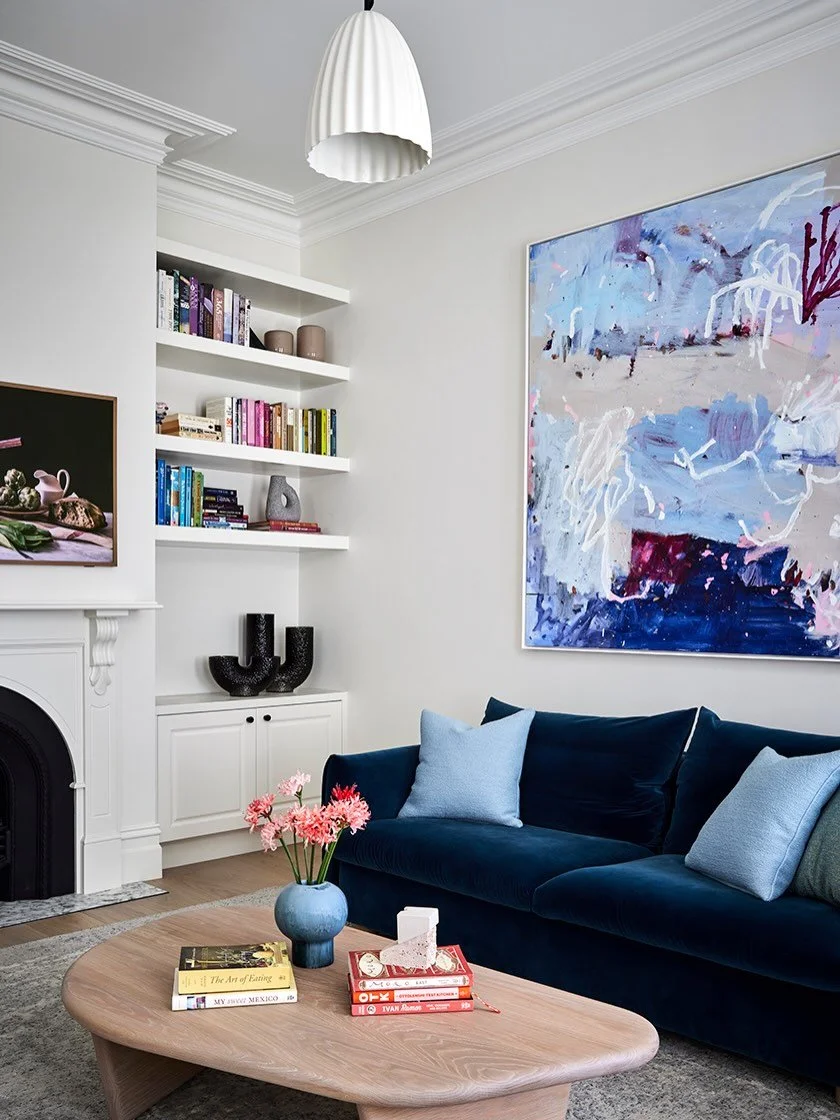 Still a crowd favourite, the Sitting Room at our Elsternwick project.

Bold blues, vibrant art, a sofa bed (hell, why not) and a layered mix of curated and considered d&eacute;cor and objects. 

A room designed not to behave too seriously, but where 