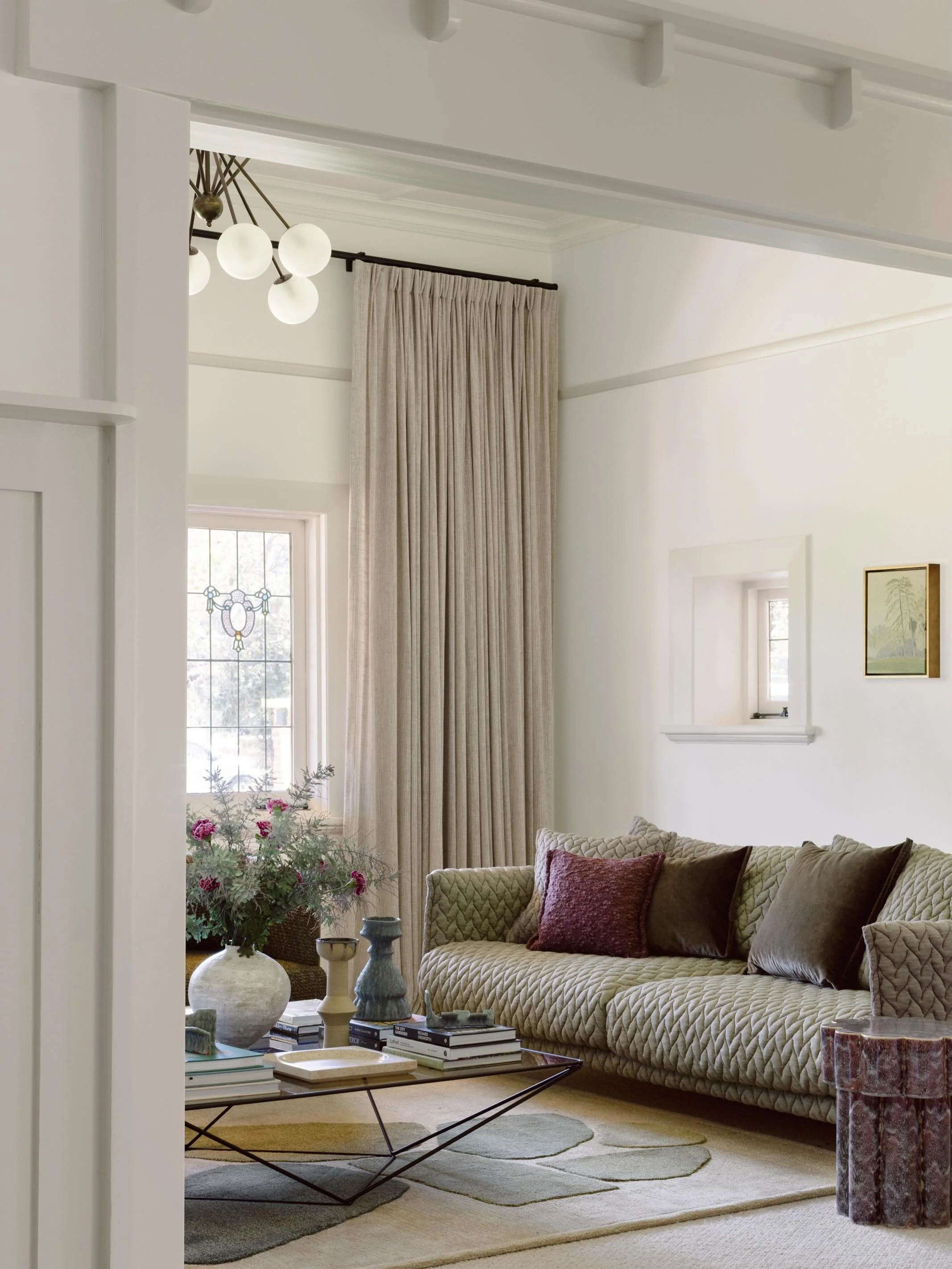 Adjacent Formal Living and Formal Dining rooms at House 1915 create an ambience that feels both nostalgic and contemporary in equal measure. Rich textures, layered colour, curated furniture, collected objects and expressive art have all been consider