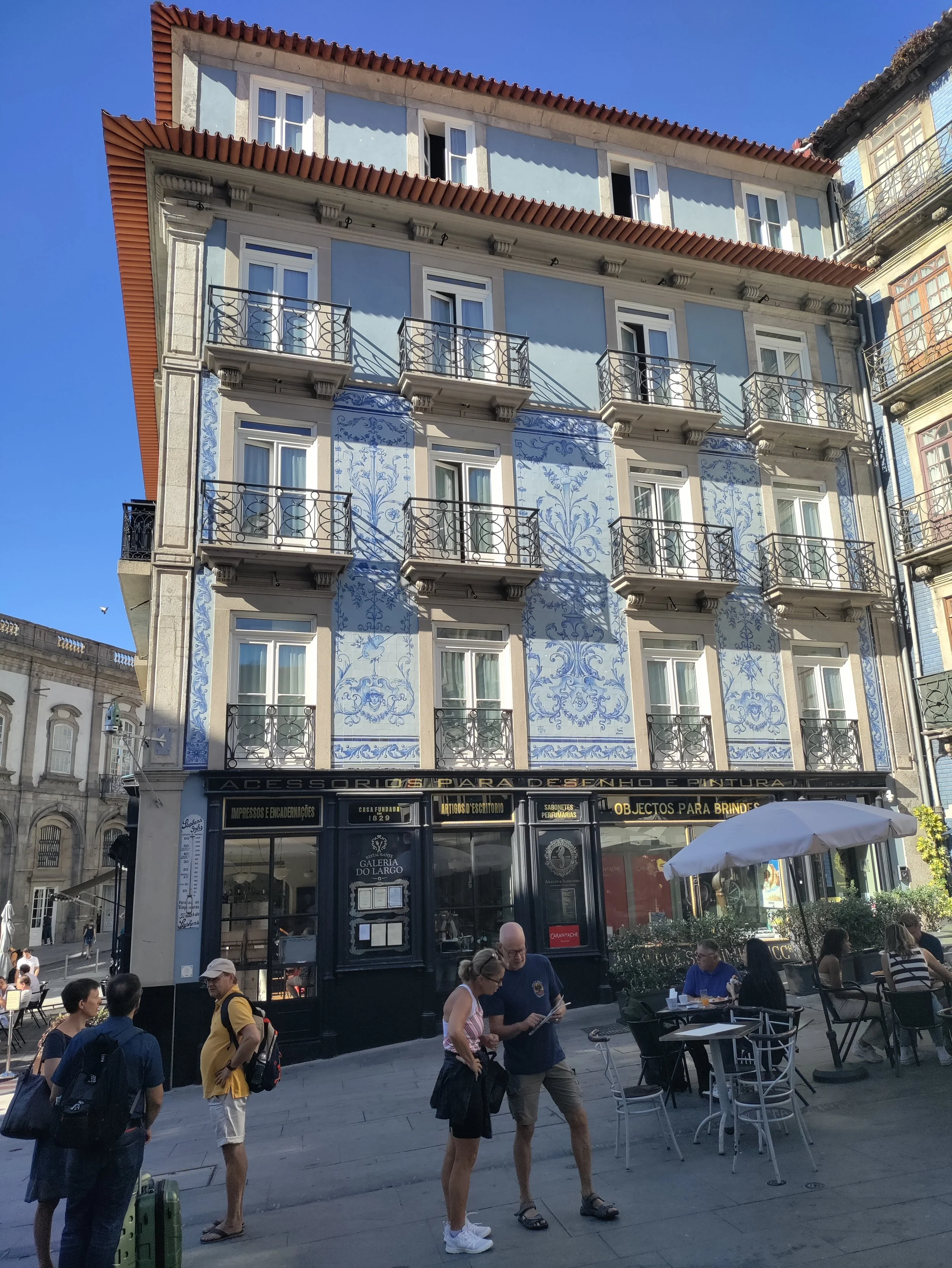 Porto: blue tile building with gold leaf on commercial areas