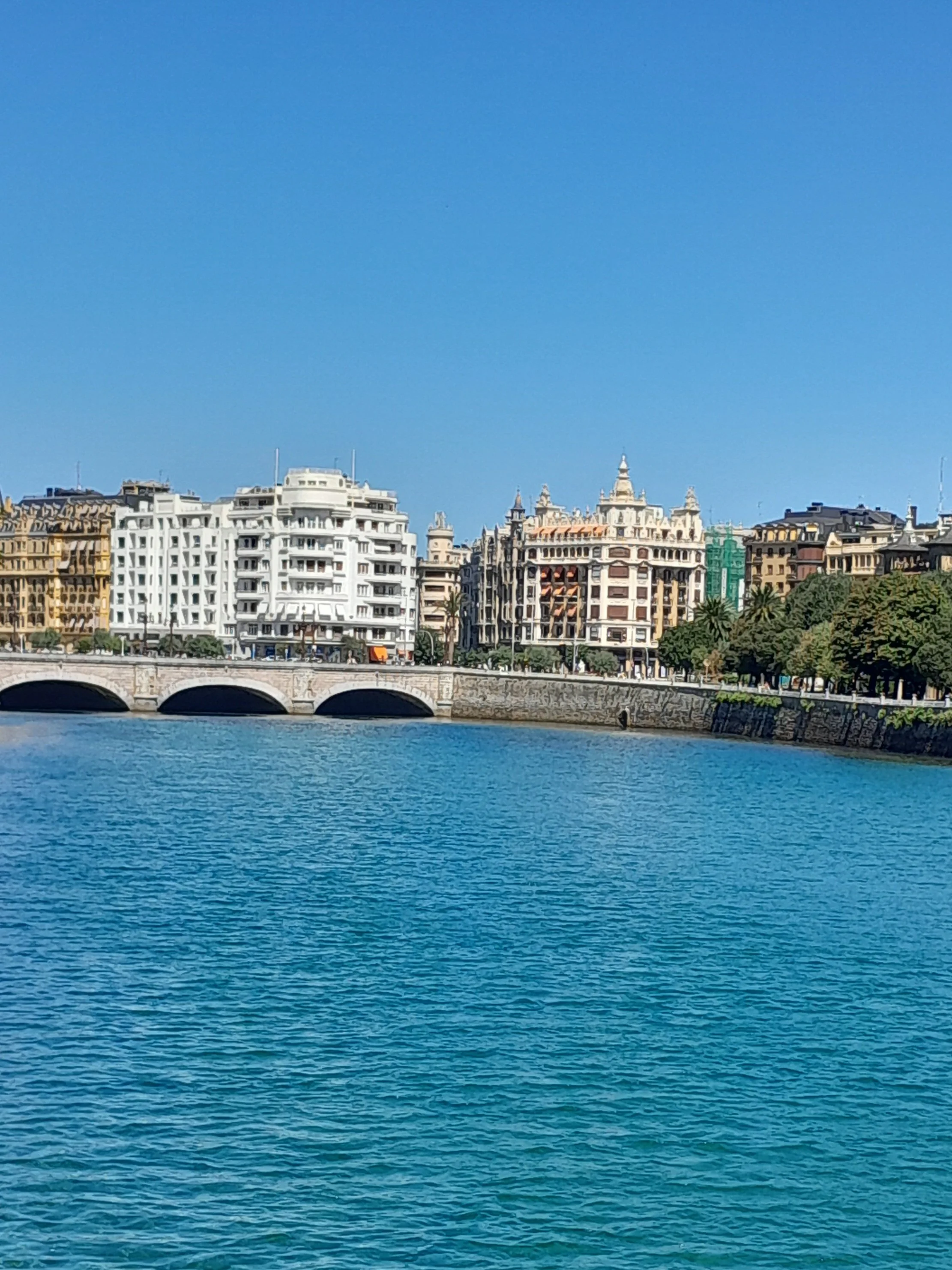View up the river of the bridge to the train station